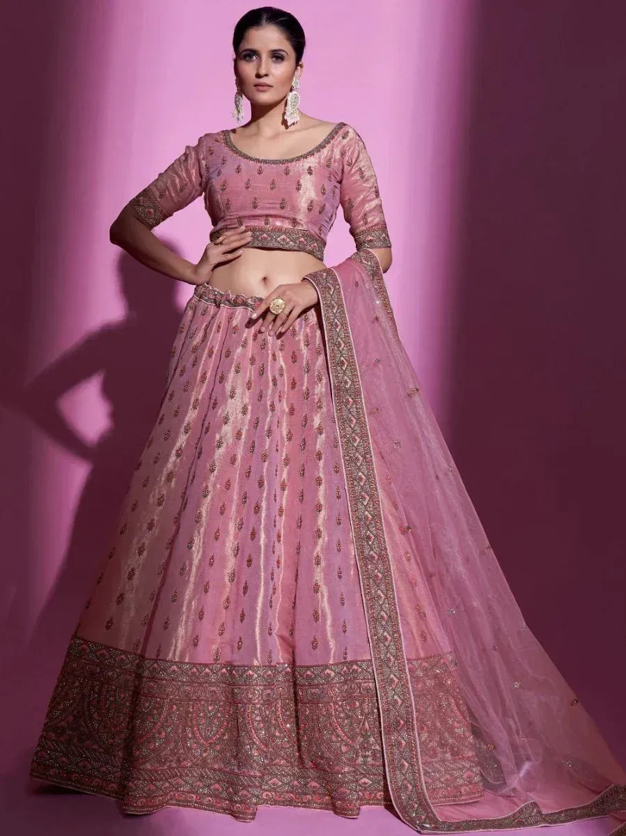 Pink designer lehenga choli with intricate embroidery and net dupatta for Indian ethnic wear