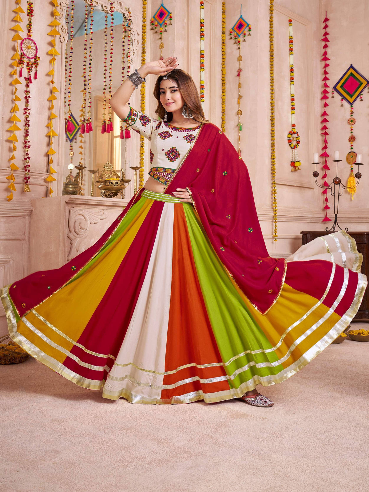 Colorful Indian lehenga choli with embroidered blouse and multi-panel skirt, perfect for festive occasions