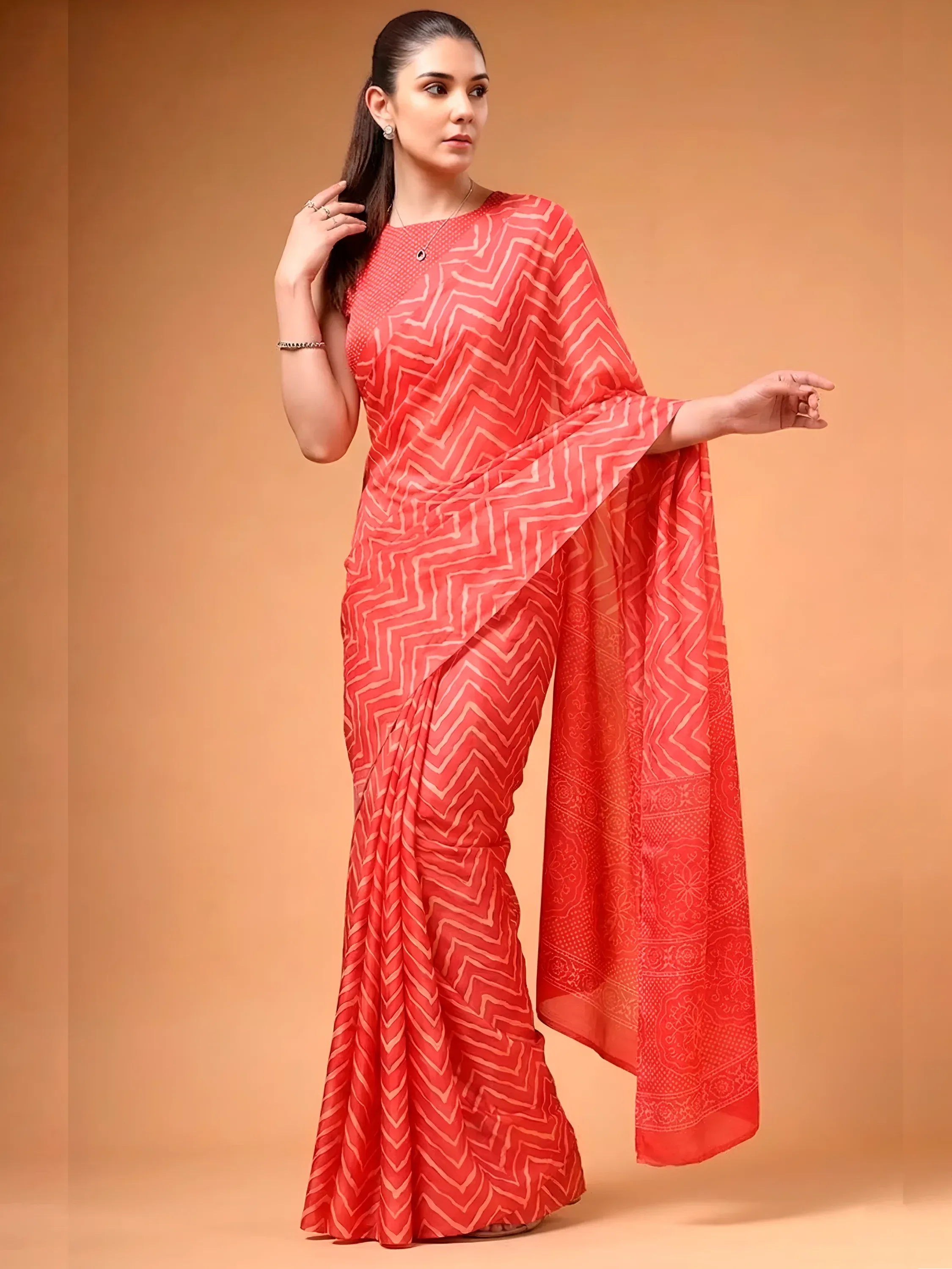 Likeable Coral Red Zig-Zag Printed Satin Wedding Wear Saree With Blouse
