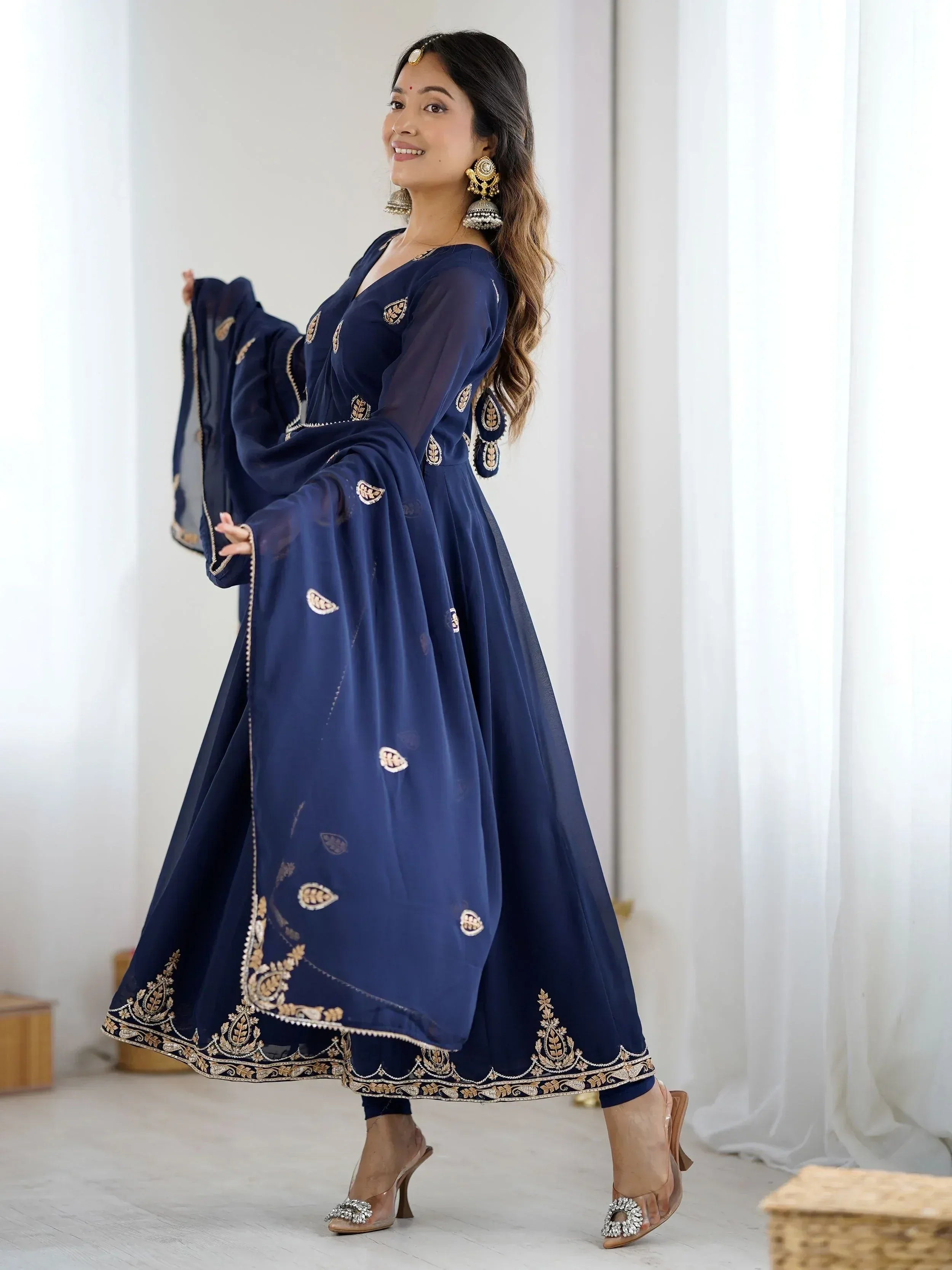 Navy blue embroidered anarkali suit with gold detailing, perfect for Indian ethnic wear occasions