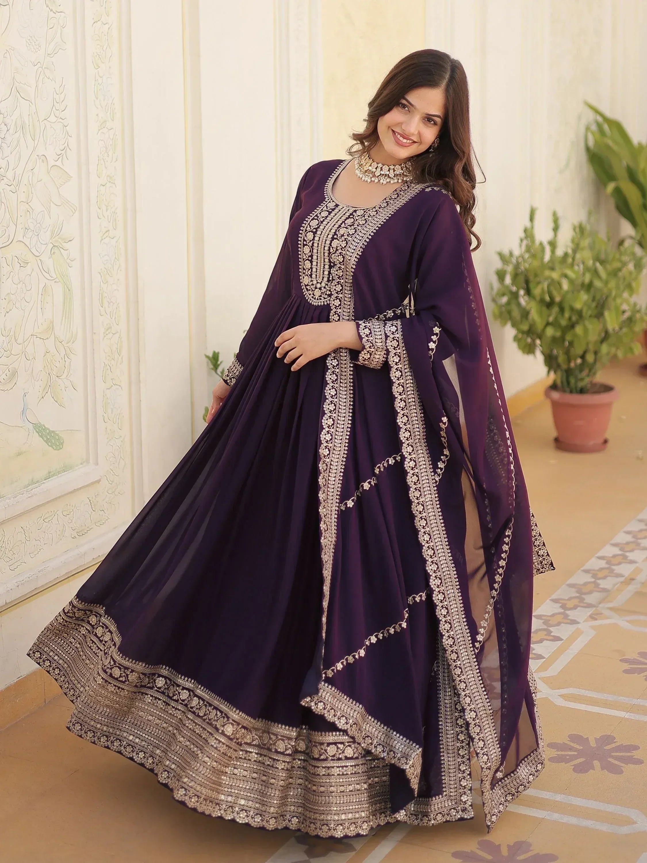 Elegant purple anarkali suit with gold embroidery, perfect for Indian ethnic wear occasions