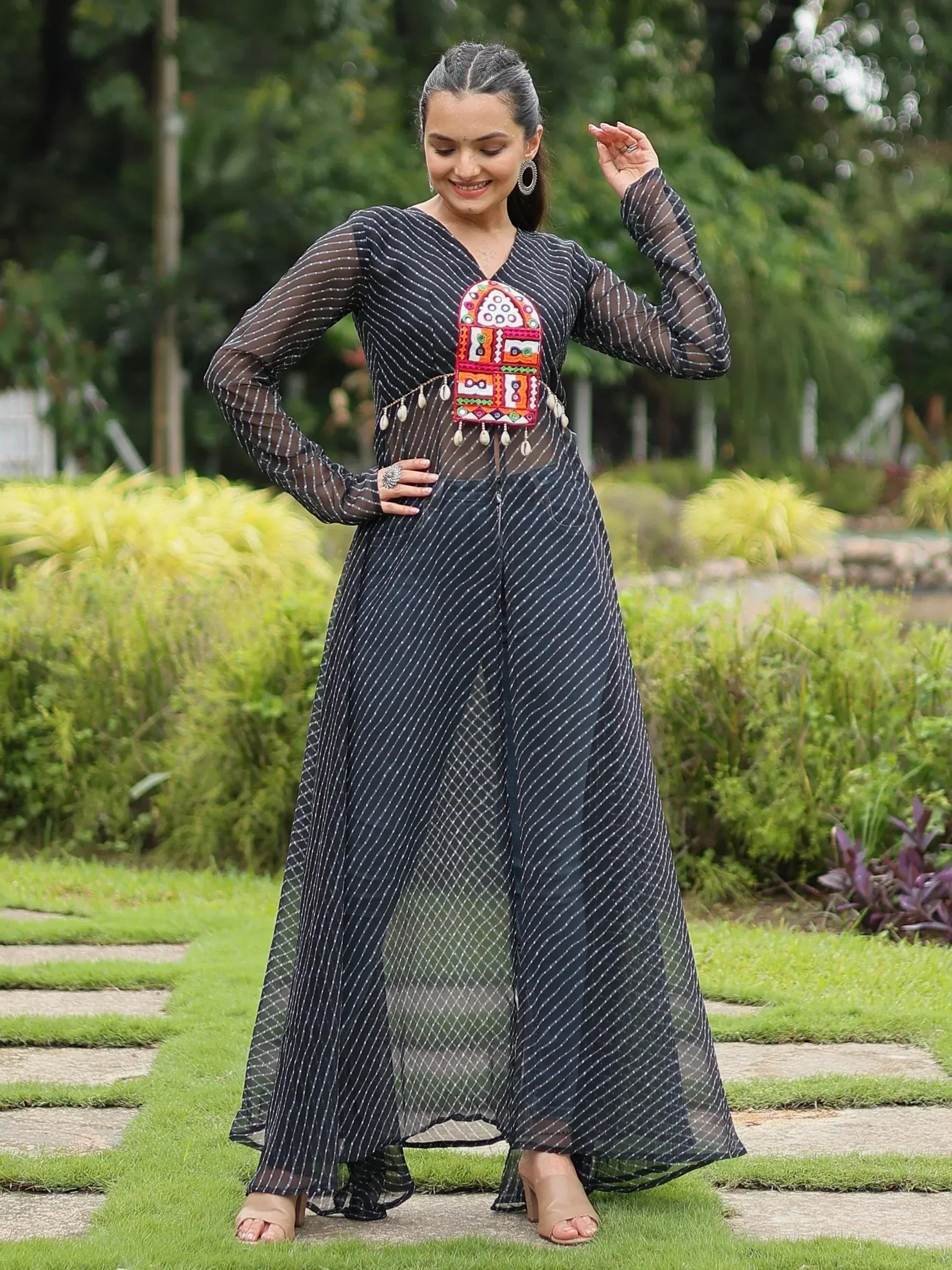 Black striped ethnic gown with colorful embroidery, perfect for Indian festive wear