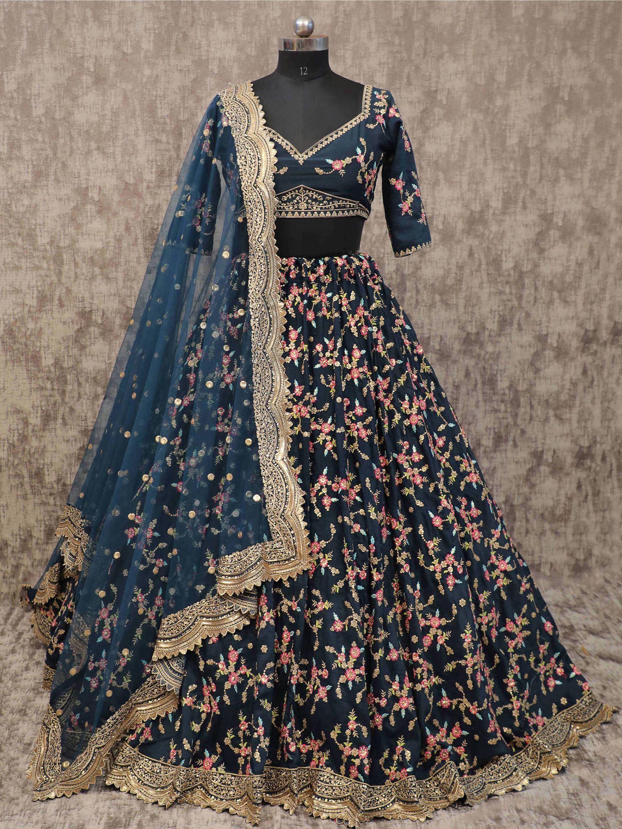 Dark blue designer lehenga choli with gold floral embroidery and sheer dupatta, ethnic wear for women