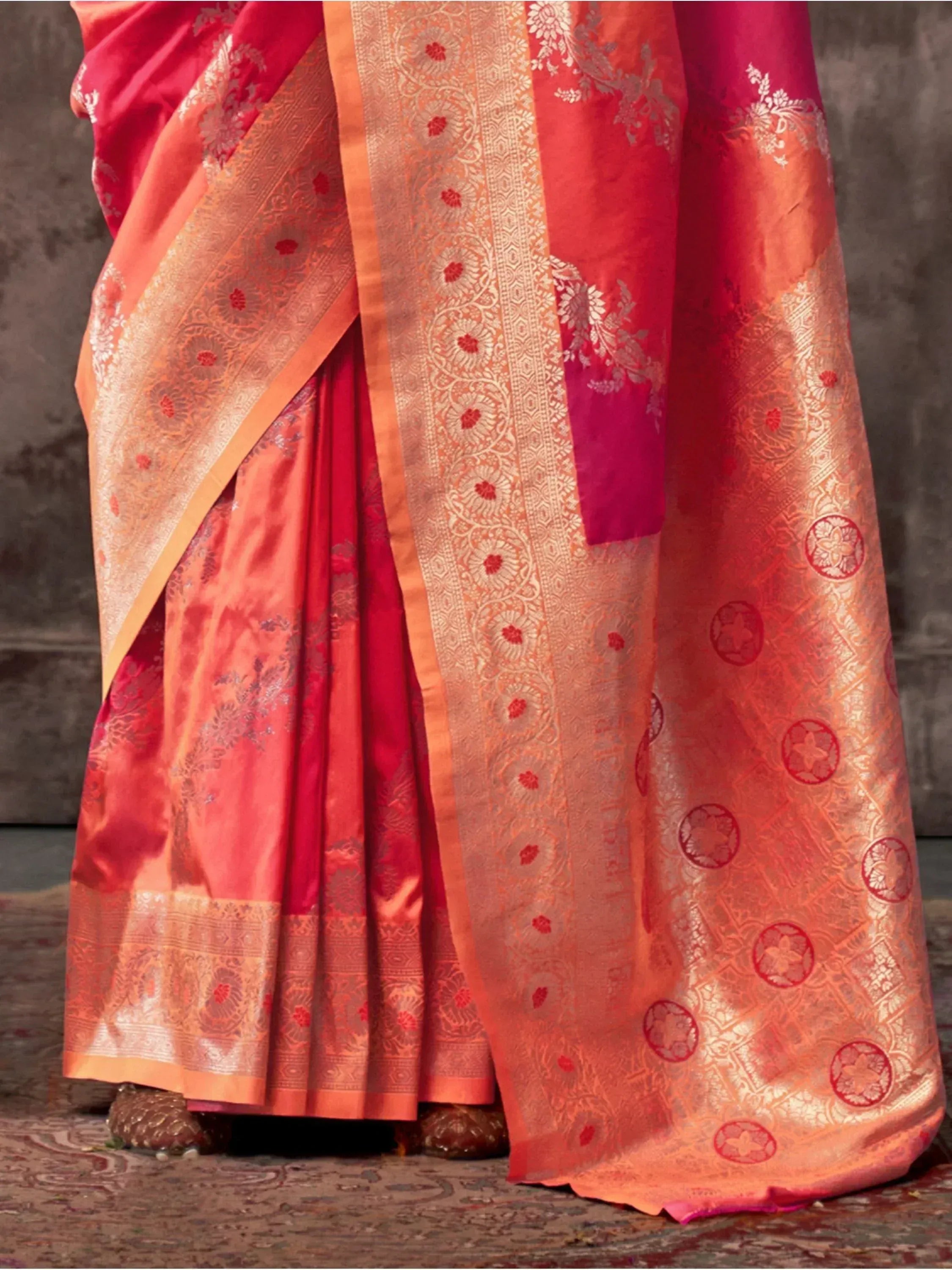 Red and orange designer saree with gold floral zari work, perfect for Indian ethnic occasions