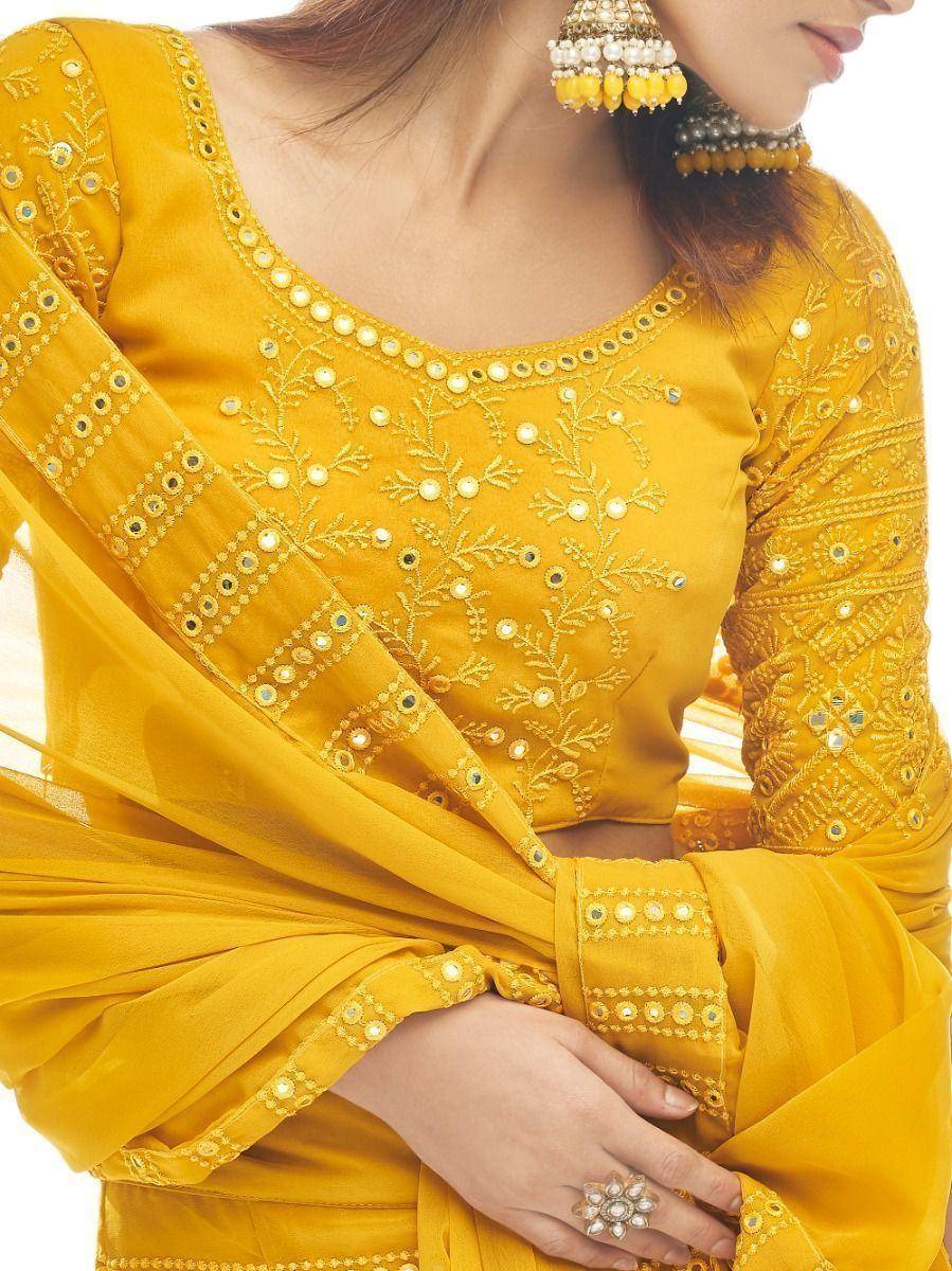 Yellow embroidered ethnic blouse with mirror work and matching dupatta, perfect for Indian festive wear
