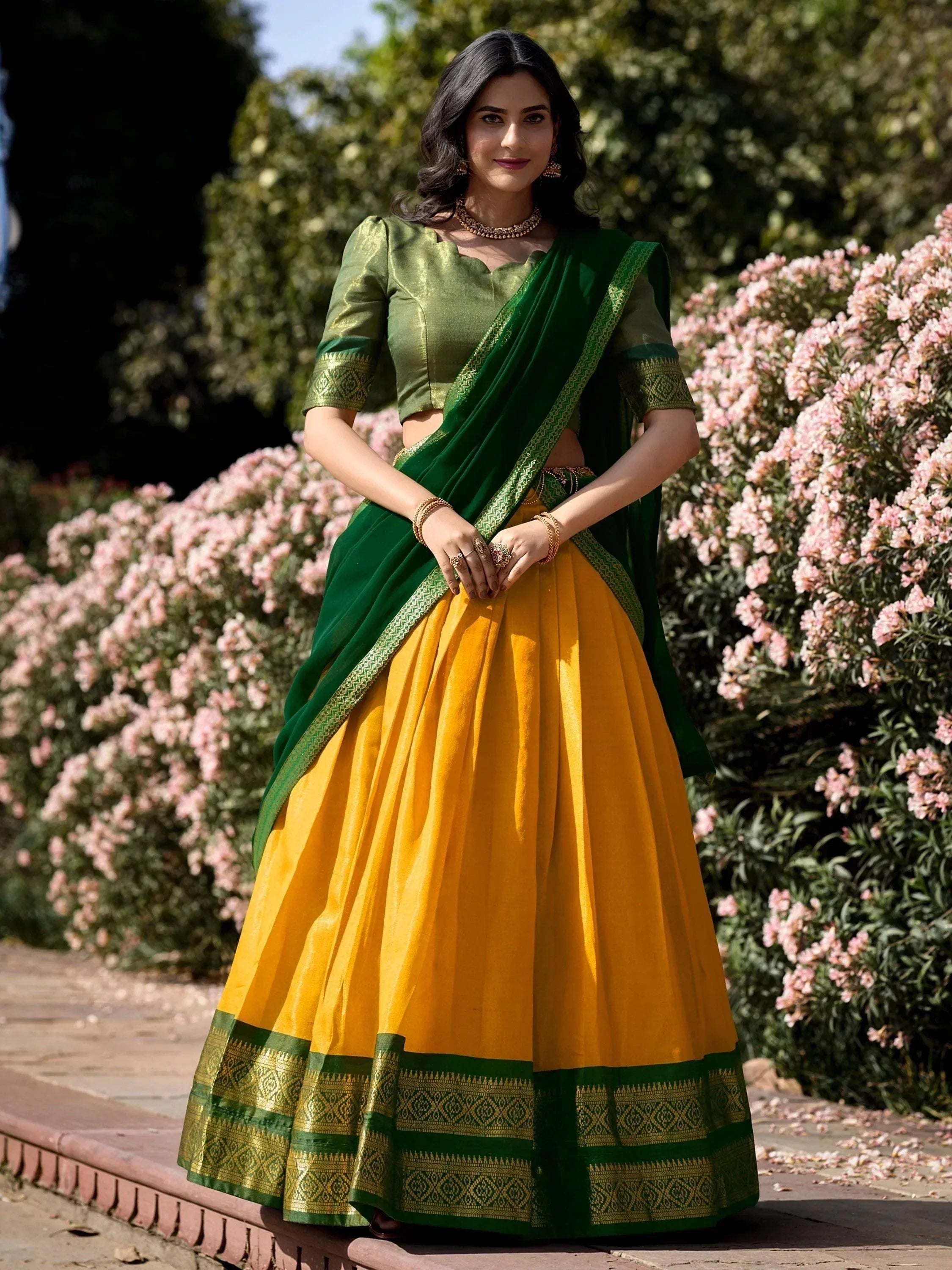 Green and yellow designer lehenga choli with gold embroidery, perfect for Indian ethnic occasions