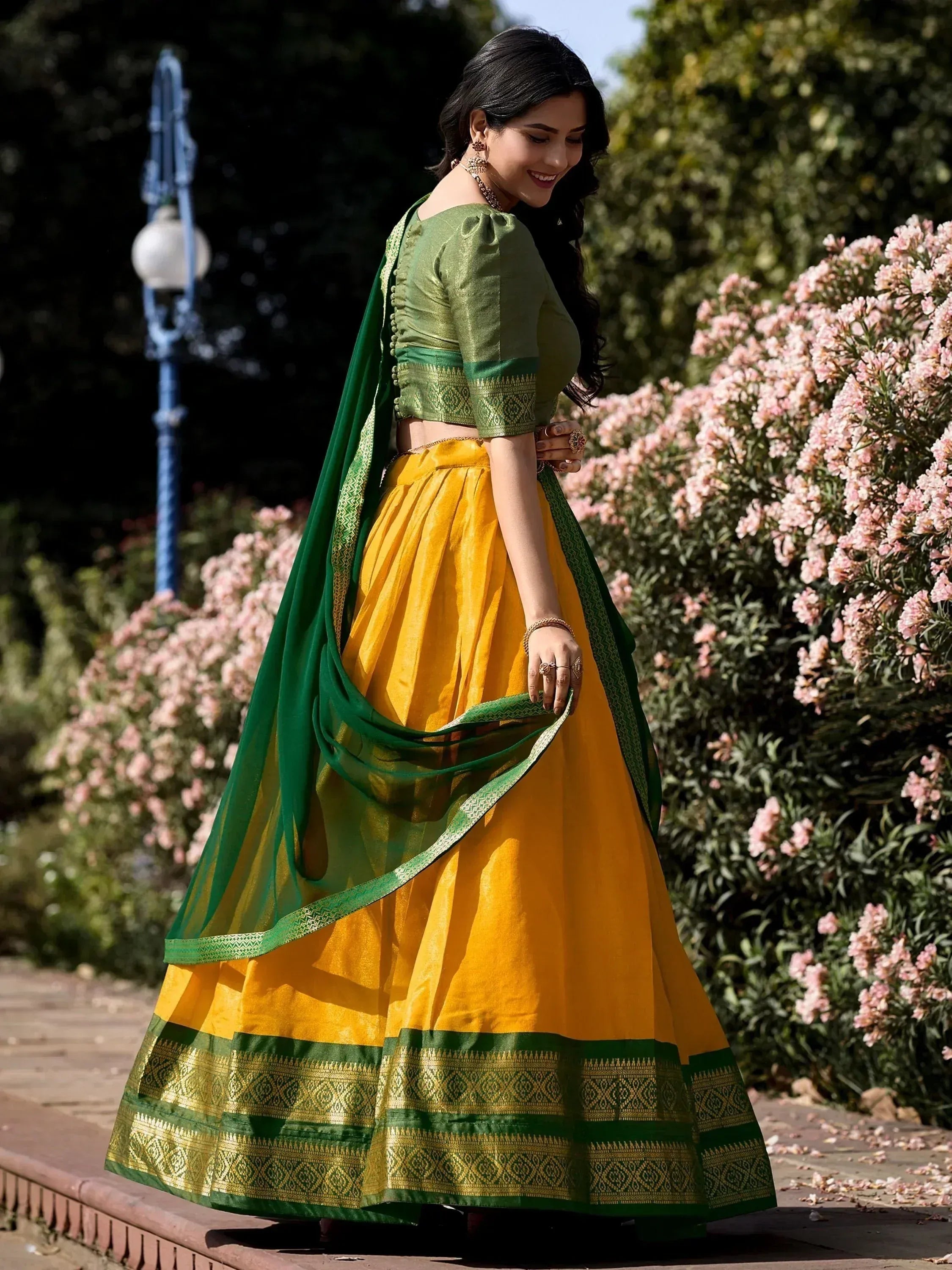 Yellow and green designer lehenga choli with embroidered dupatta, perfect for Indian ethnic occasions