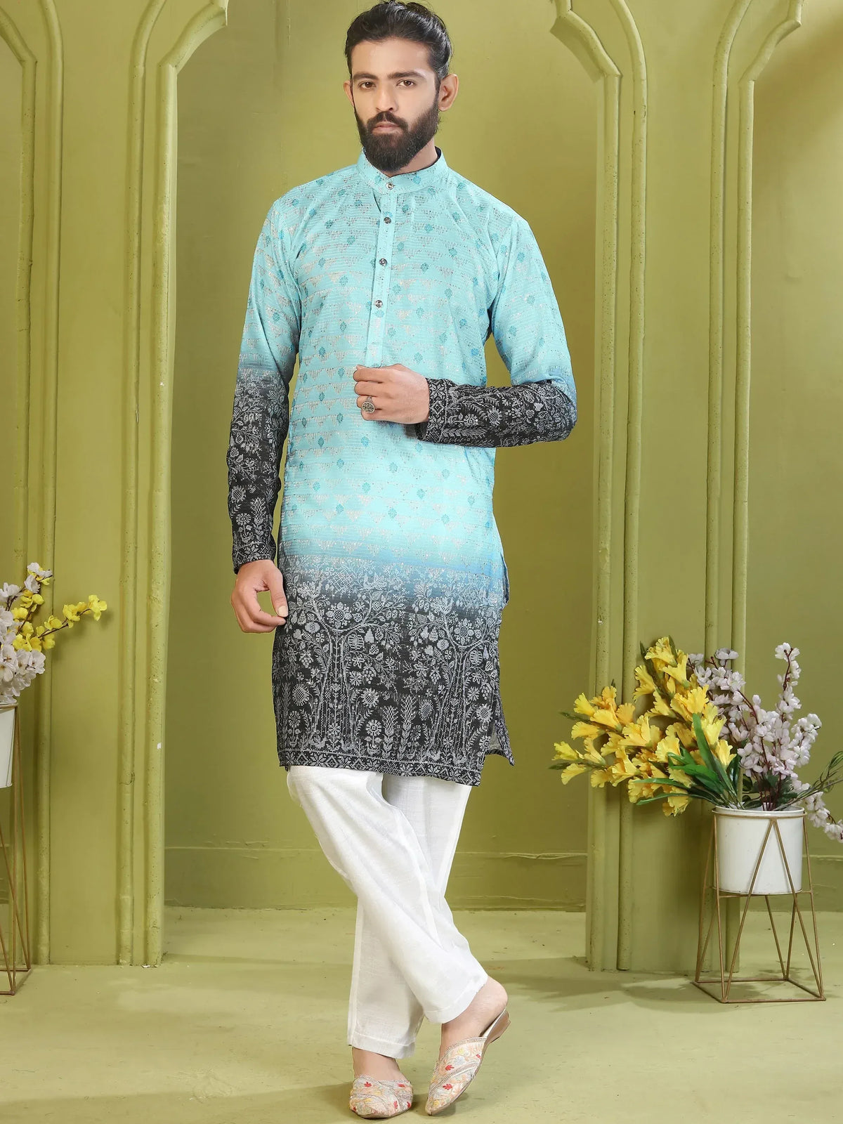 Men's ethnic kurta with blue to black ombre print, paired with white pants and embroidered juttis