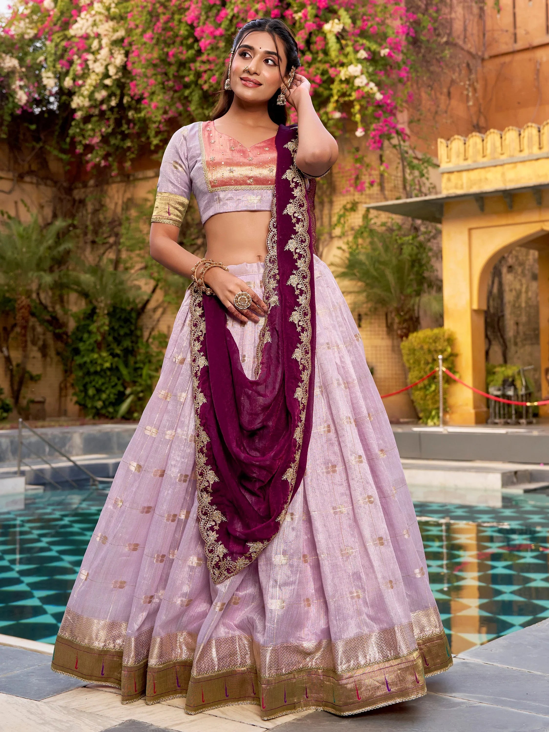 Captivating Lavender Embroidered Silk Marriage Wear Lehenga Choli