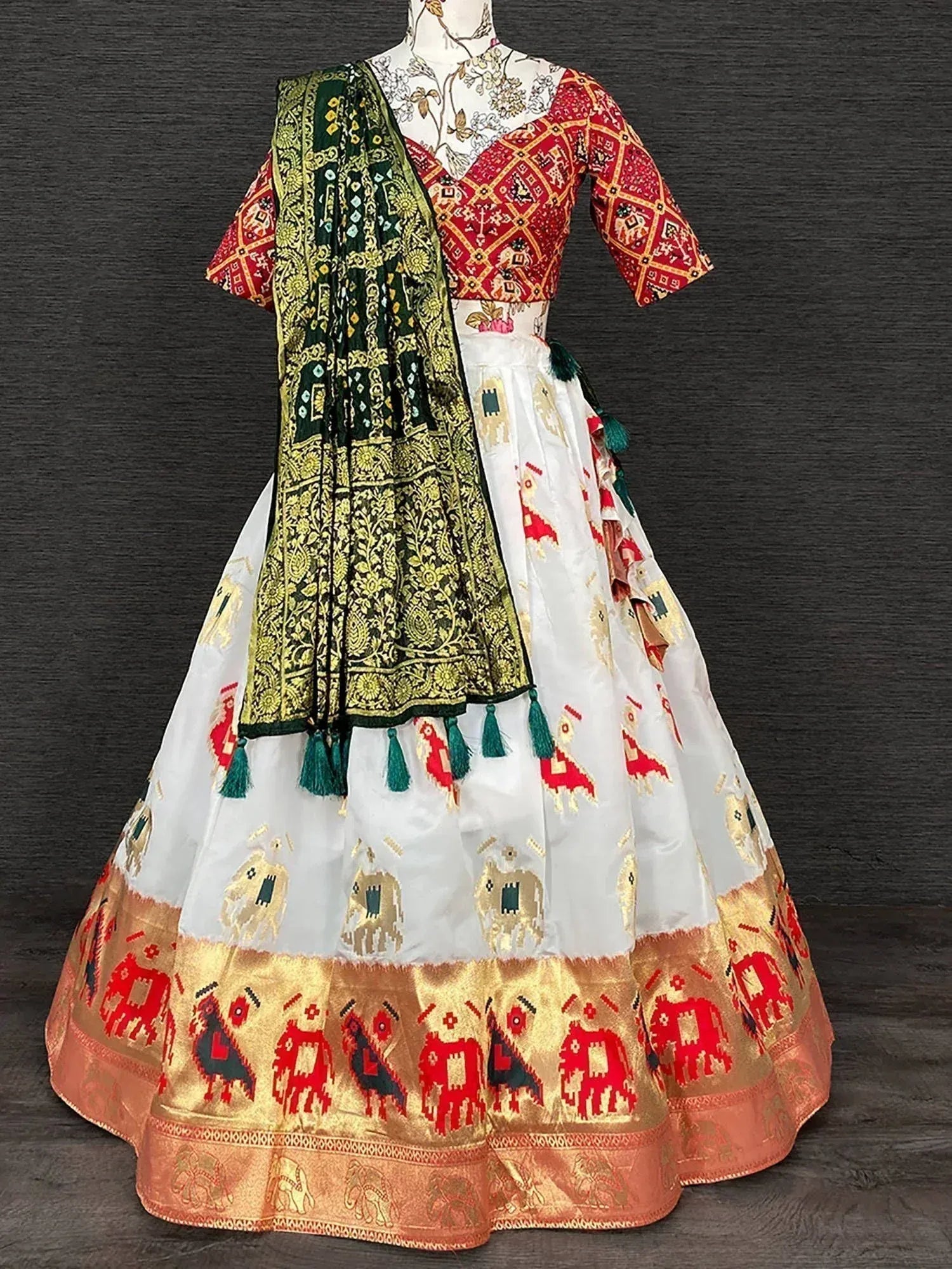 White lehenga with red gold elephant print, red blouse, green dupatta for Indian ethnic wear