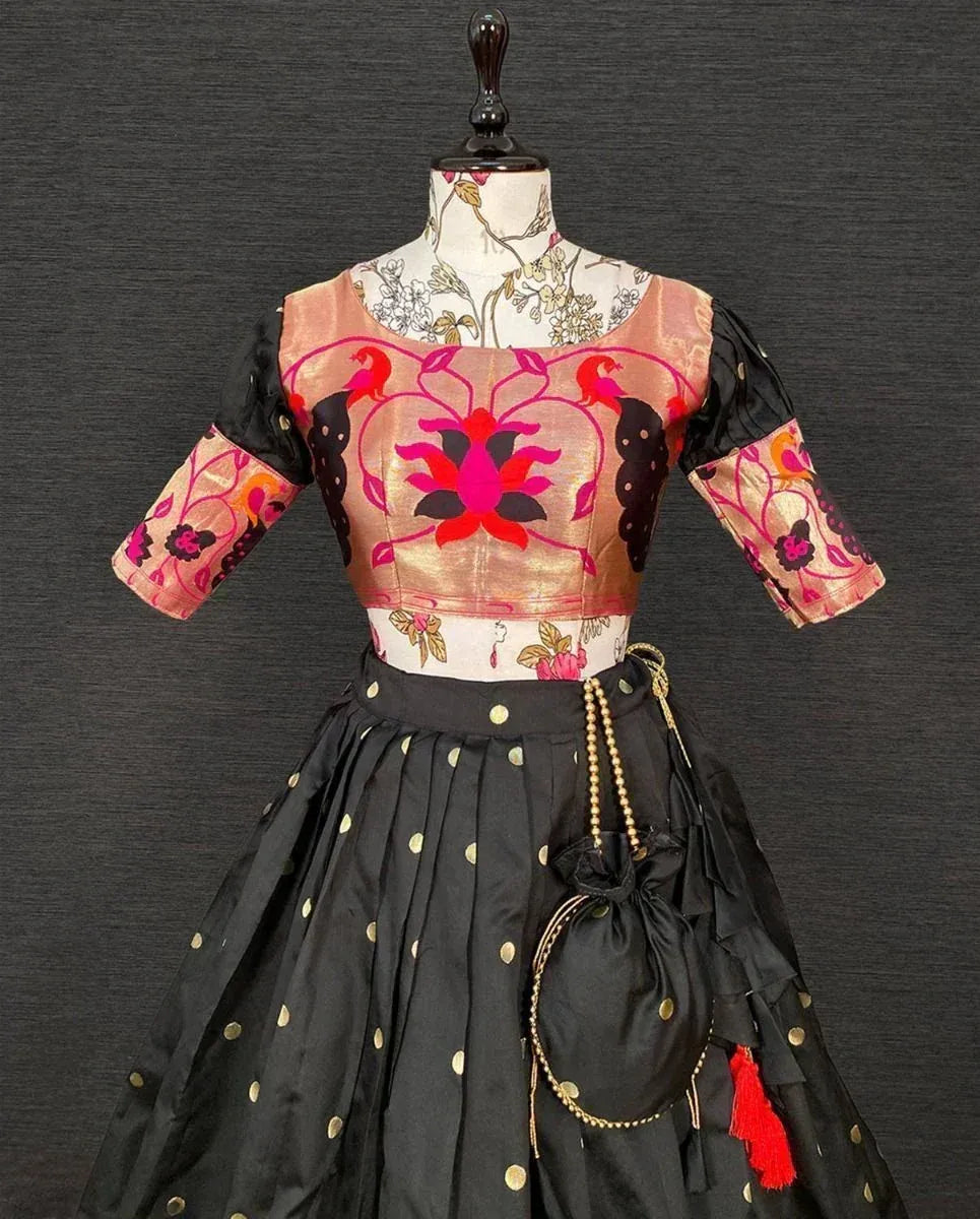 Black and pink embroidered lehenga choli with gold polka dots and floral blouse design