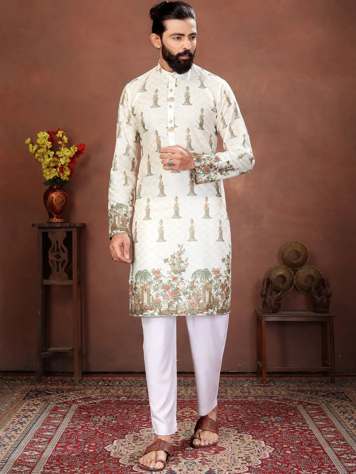 Man wearing a white floral print ethnic kurta with white pajamas