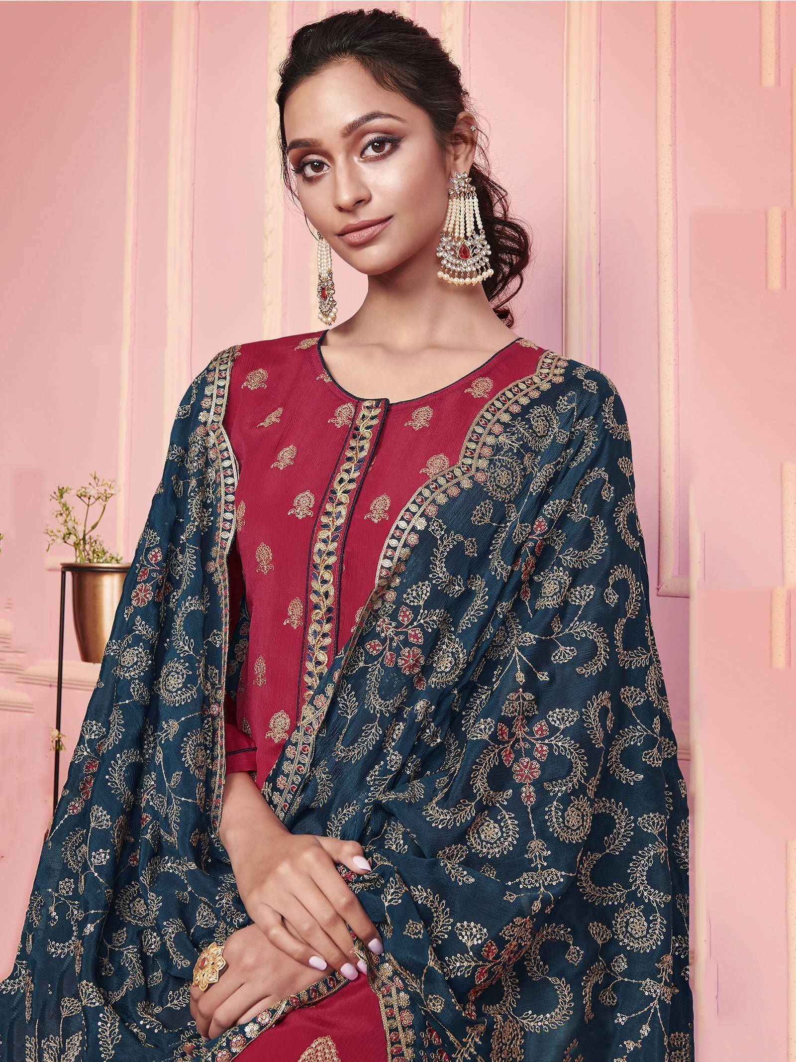 Elegant maroon and navy blue embroidered salwar kameez with floral dupatta, perfect for Indian ethnic occasions.