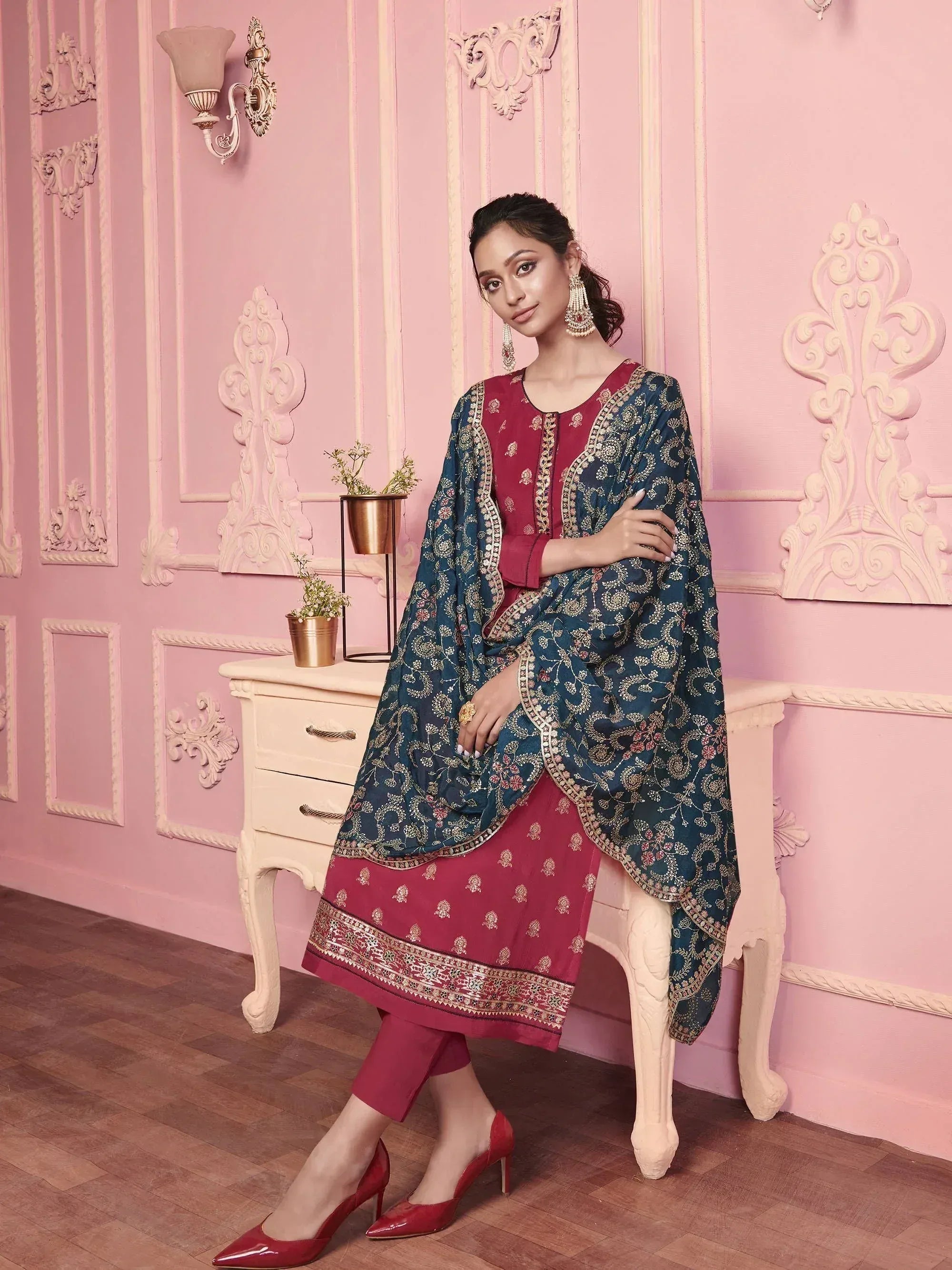 Elegant maroon and teal embroidered salwar kameez with floral dupatta, perfect for Indian ethnic wear.