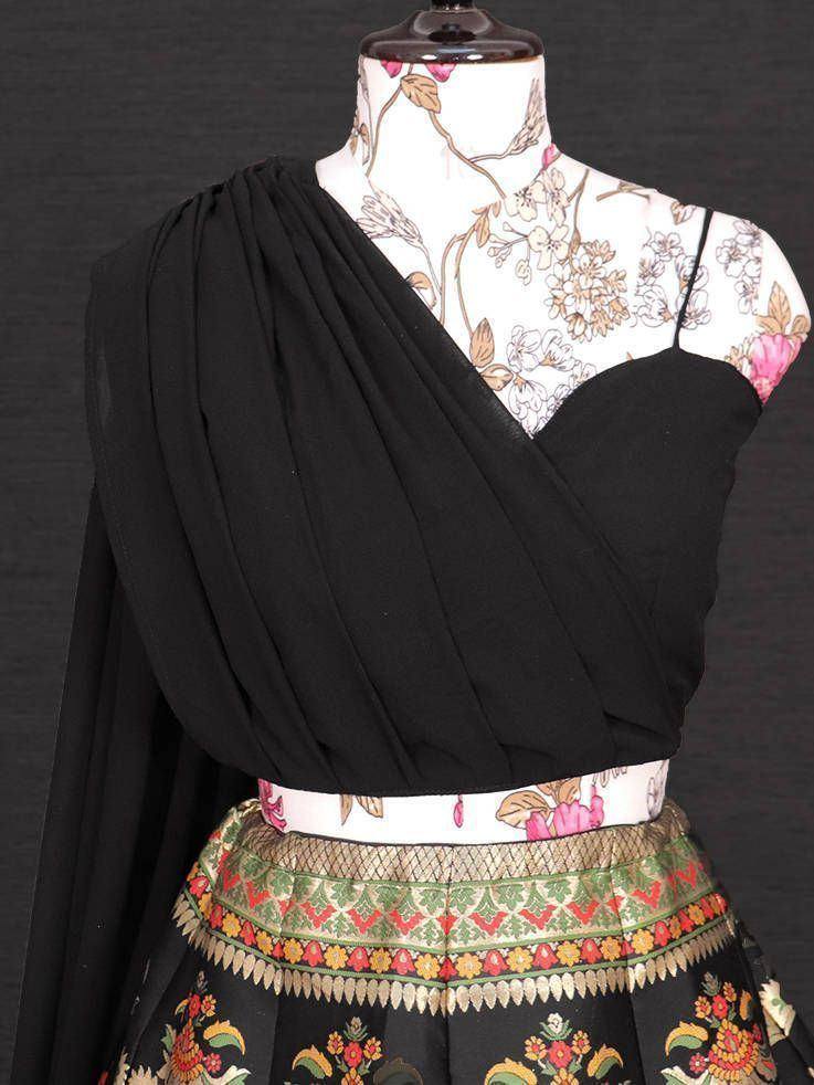 Black floral lehenga choli with embroidered border and draped dupatta, ethnic Indian wear