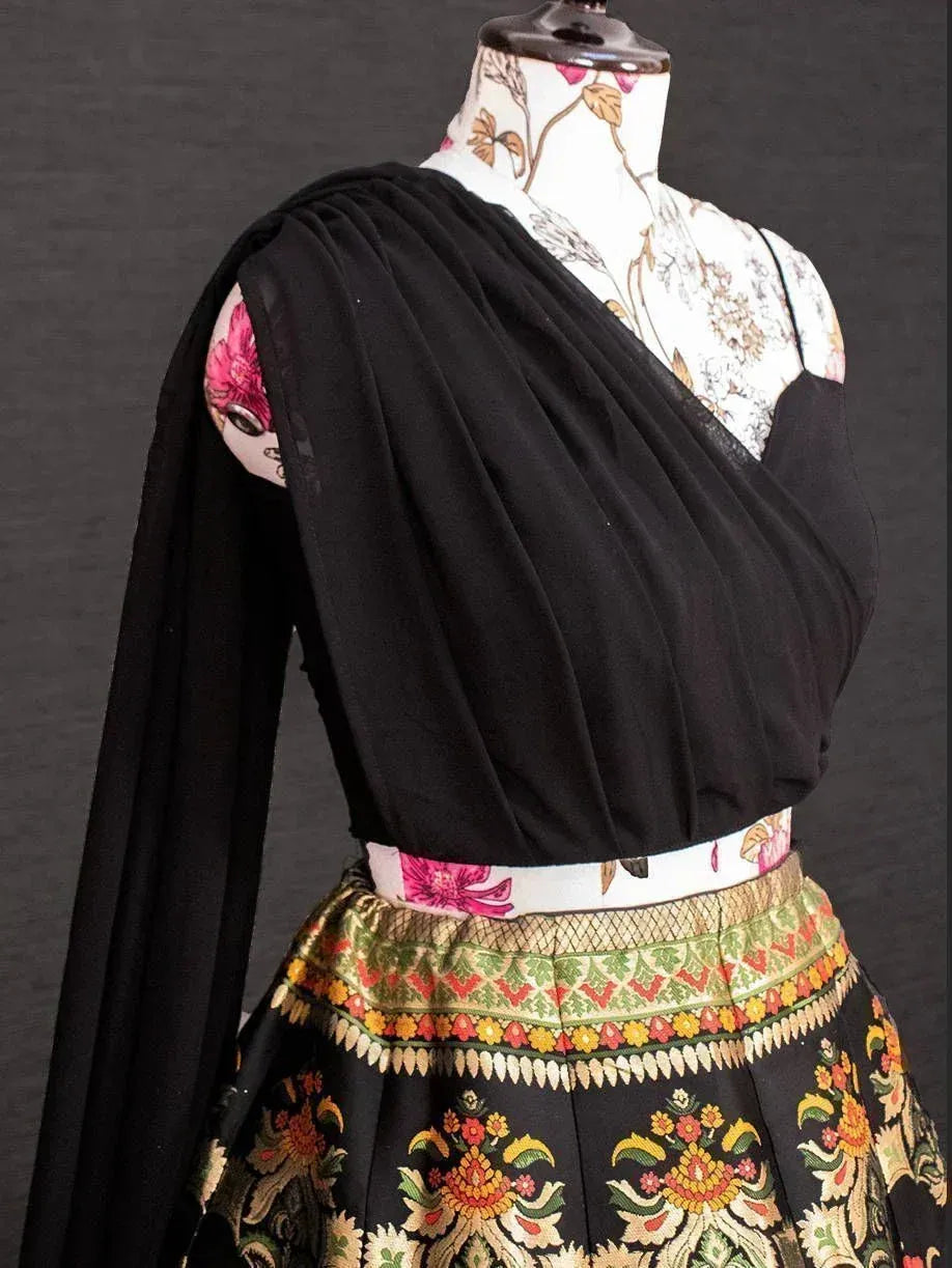 Black floral lehenga choli with embroidered skirt and draped dupatta, ethnic Indian wear