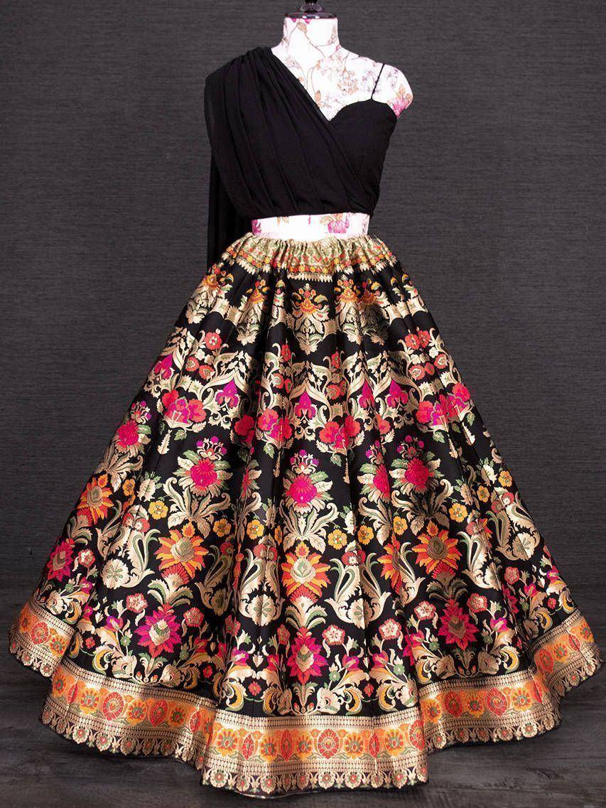 Black floral embroidered lehenga choli with gold border, ethnic Indian wear for weddings and parties