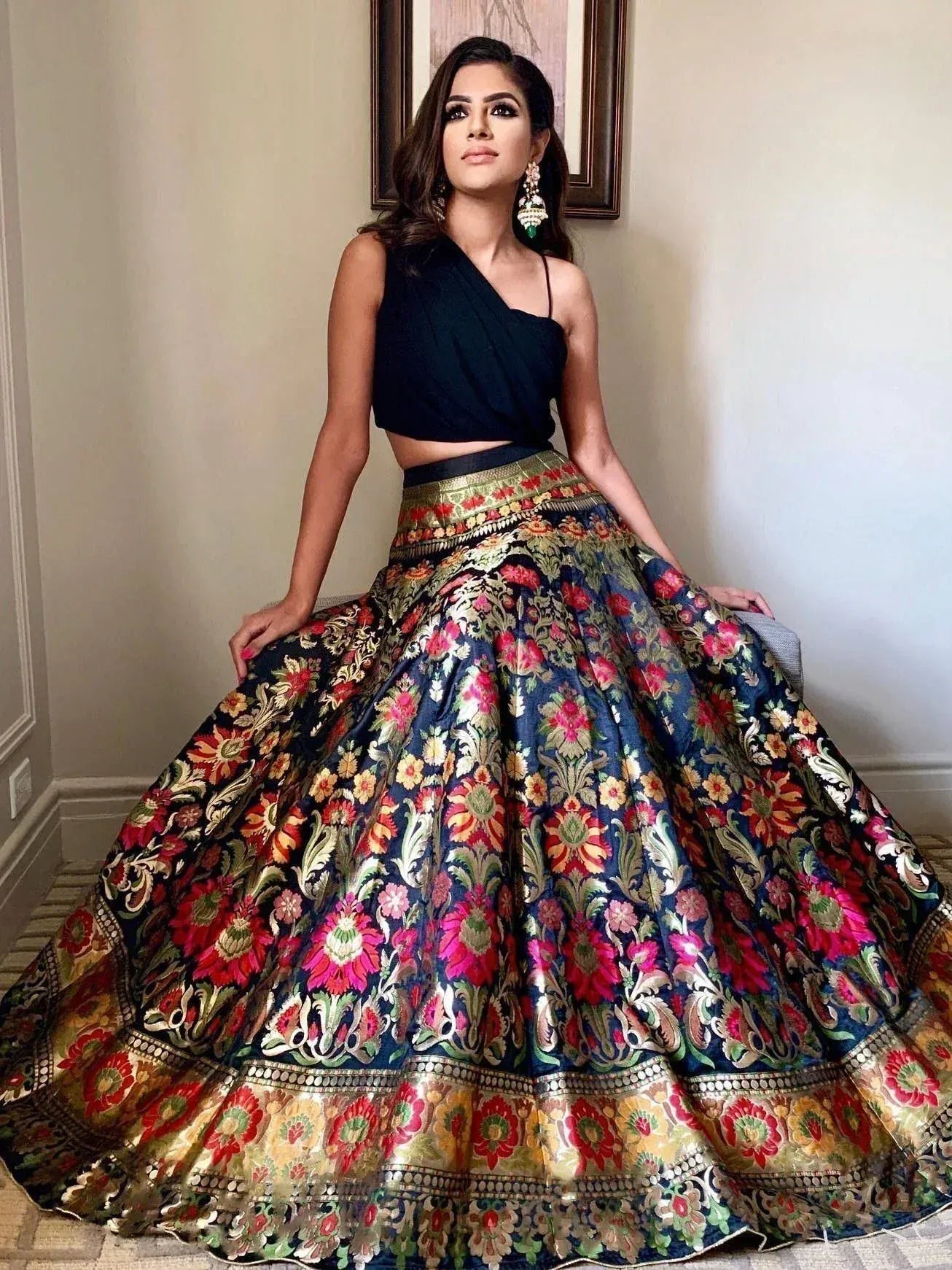 Elegant floral lehenga choli with black crop top, perfect for Indian ethnic wear occasions