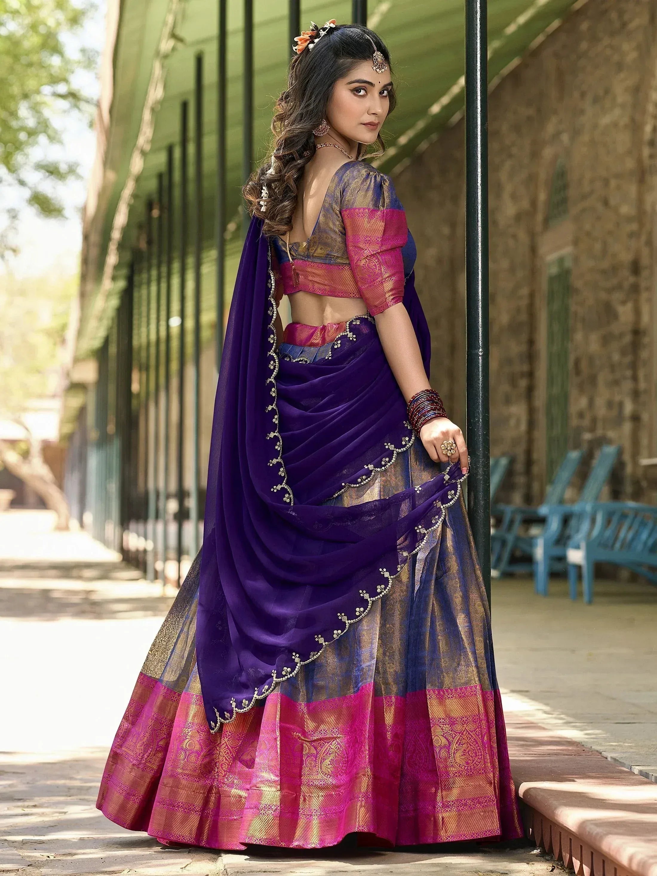 Purple and pink designer lehenga choli with gold embroidery, perfect for Indian ethnic wear occasions