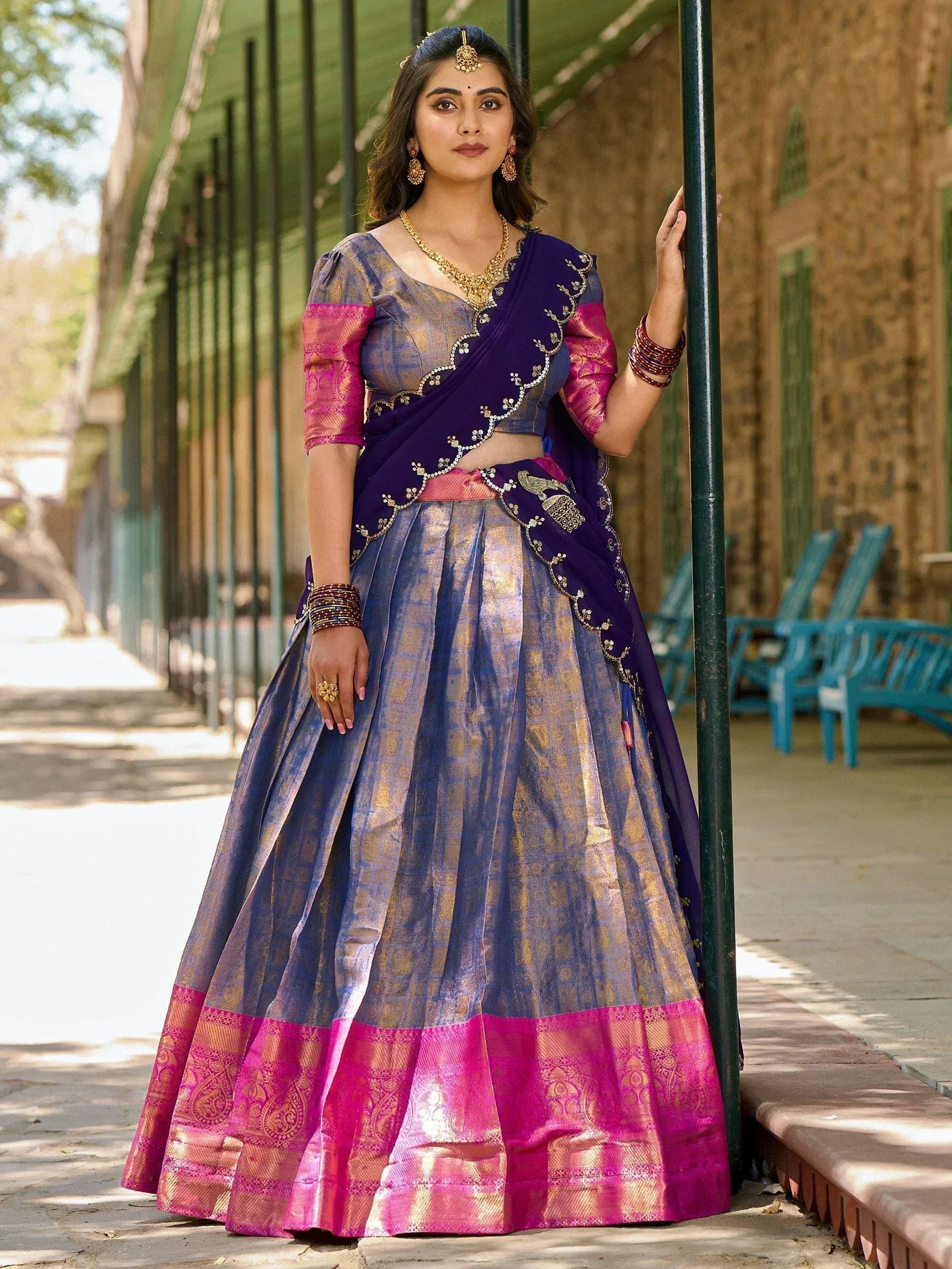 Purple and pink designer lehenga choli with gold embroidery, perfect for Indian ethnic wear occasions