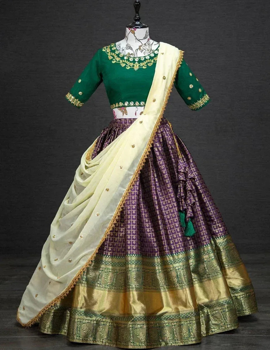 Green and purple designer lehenga choli with gold embroidery and cream dupatta, ethnic Indian wear