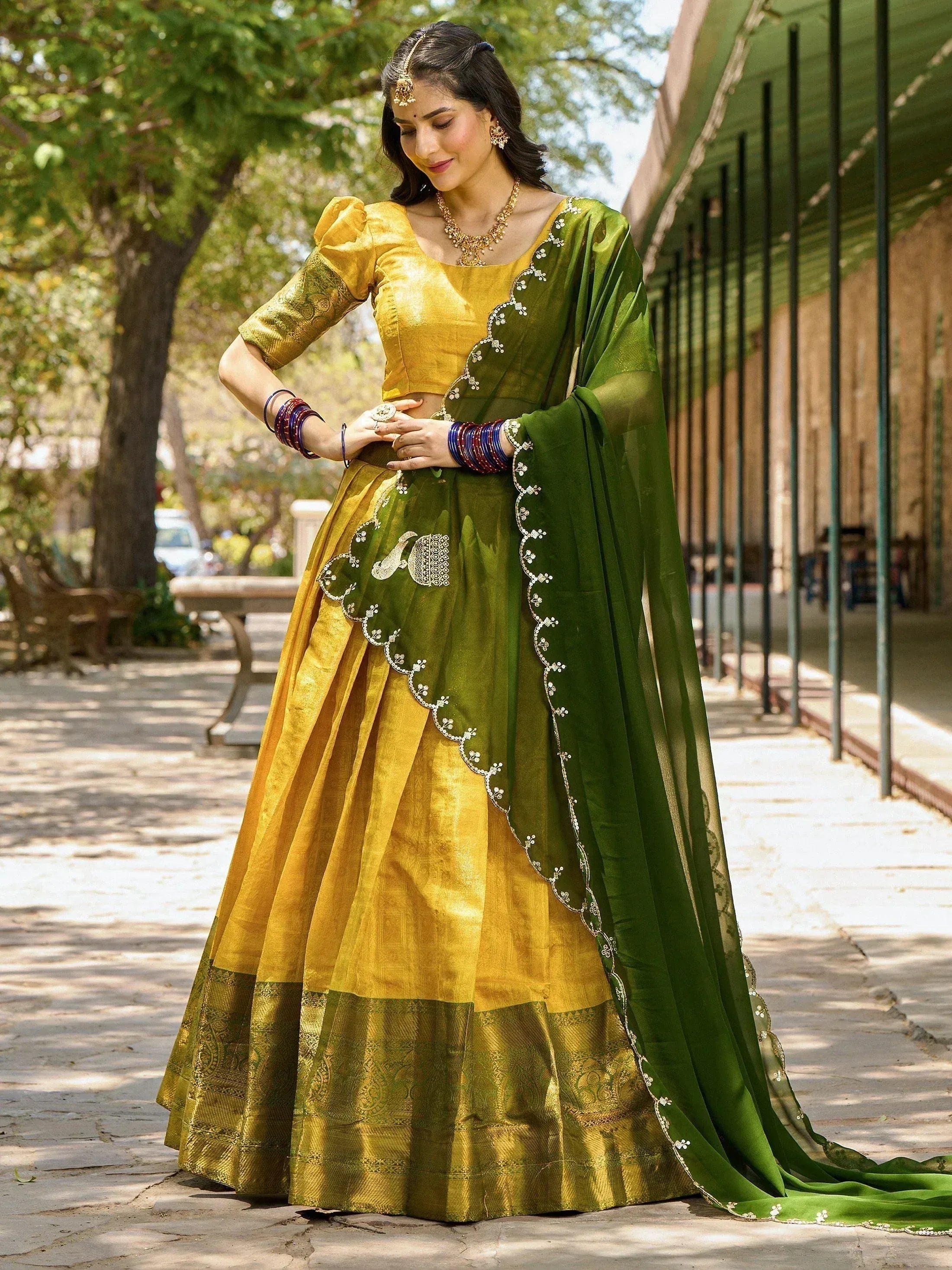 Green and gold designer lehenga choli with embroidery, perfect for Indian ethnic wear occasions