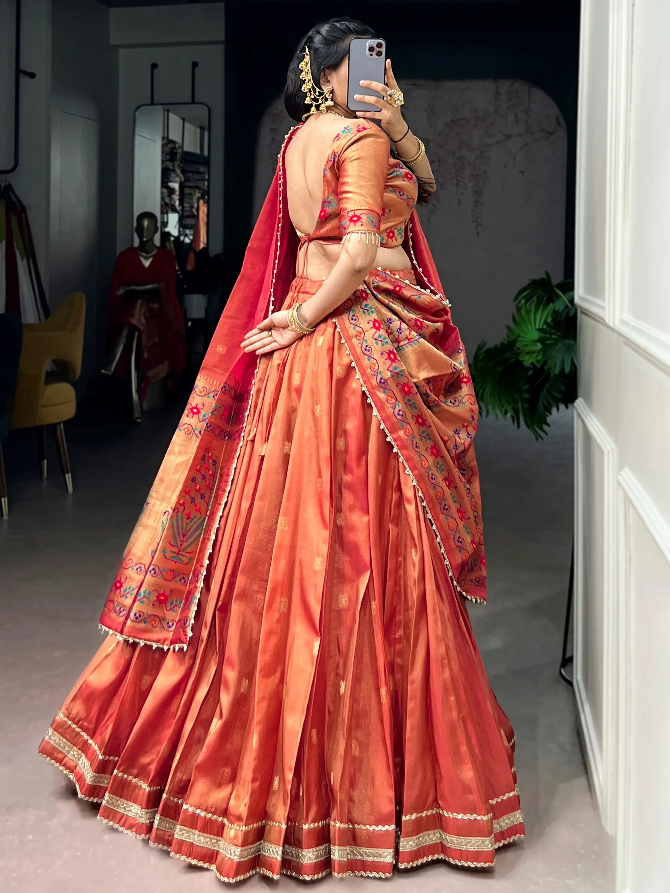 Wonderful Orange Zari Weaving Shimmer Festive Wear Lehenga Choli