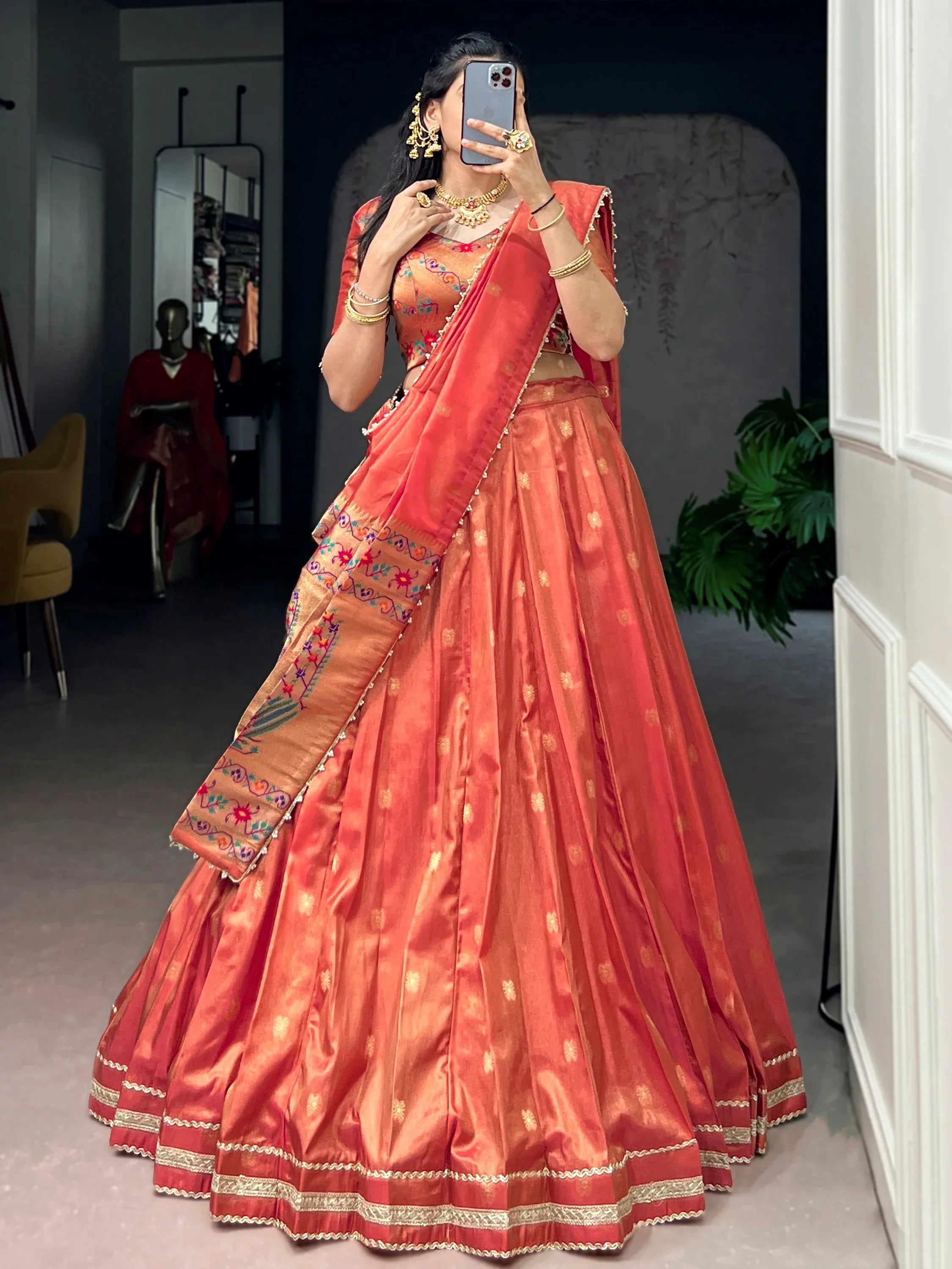 Wonderful Orange Zari Weaving Shimmer Festive Wear Lehenga Choli