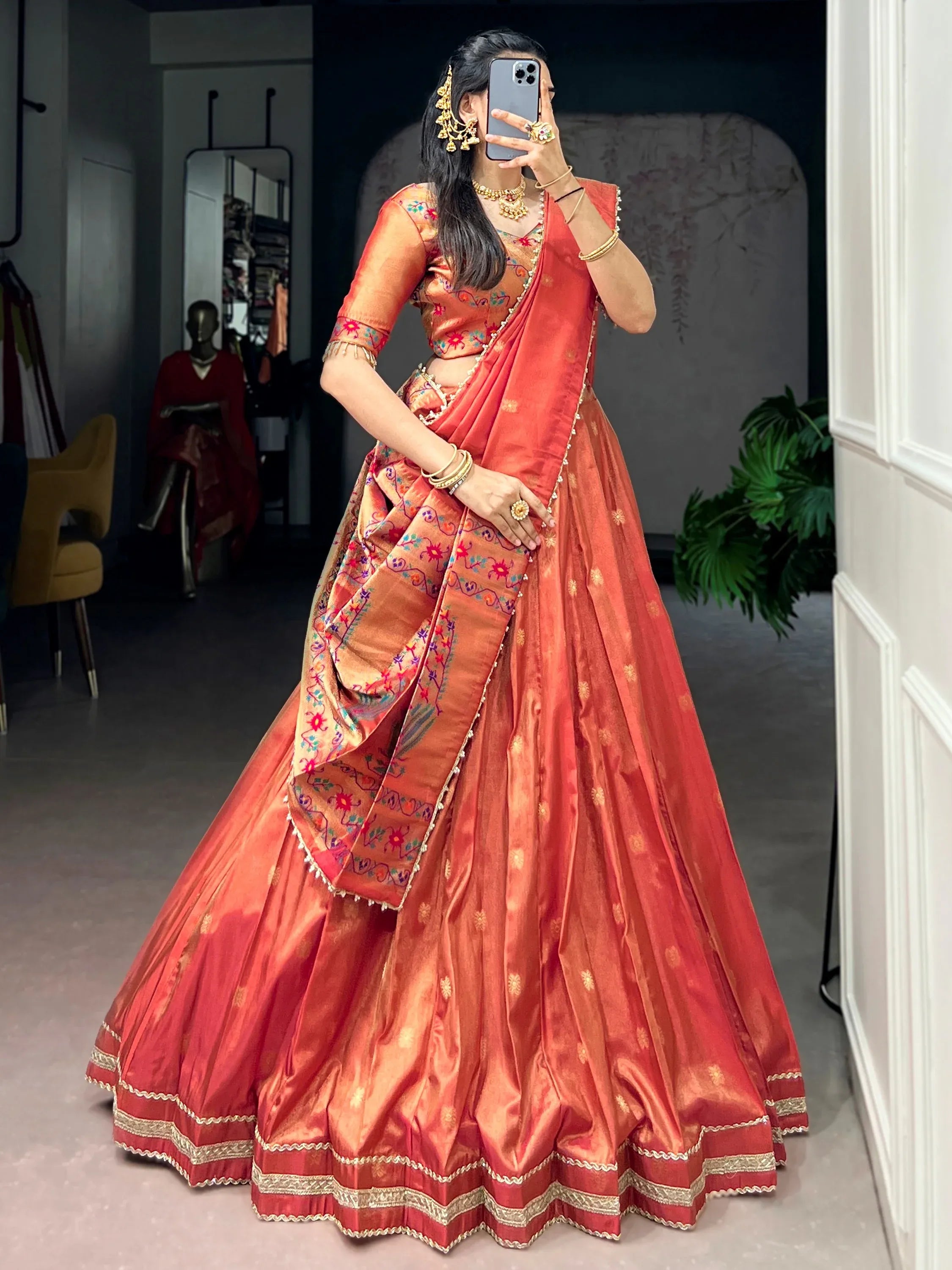 Wonderful Orange Zari Weaving Shimmer Festive Wear Lehenga Choli