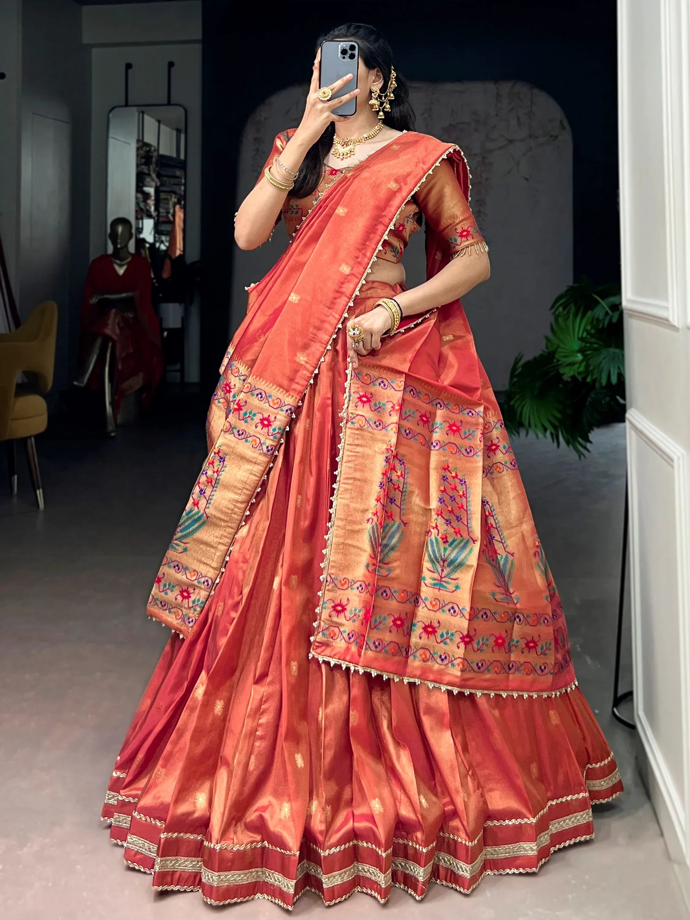 Wonderful Orange Zari Weaving Shimmer Festive Wear Lehenga Choli