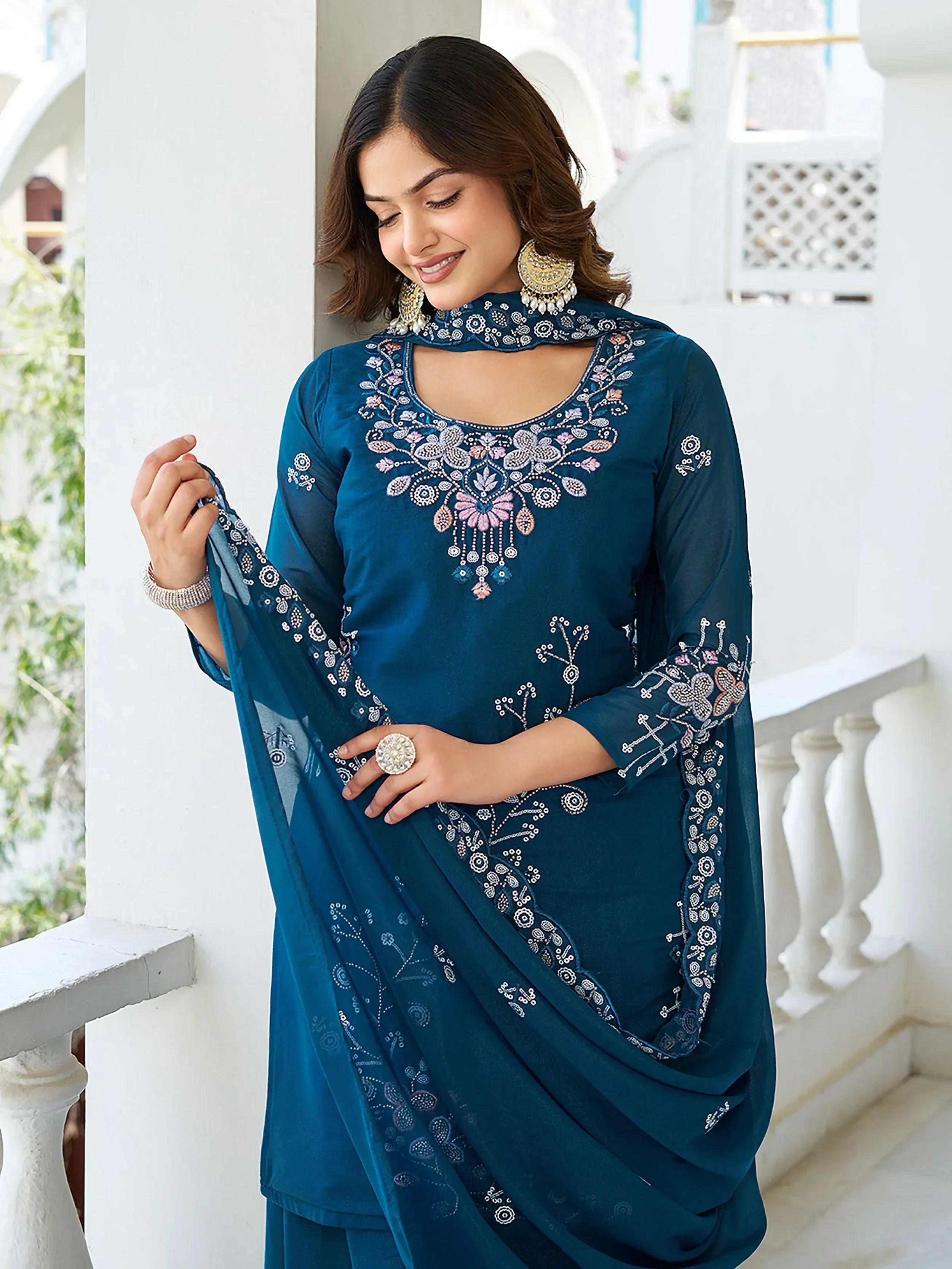 Mesmerizing Blue Georgette Sequins Embroidered Palazzo Suit