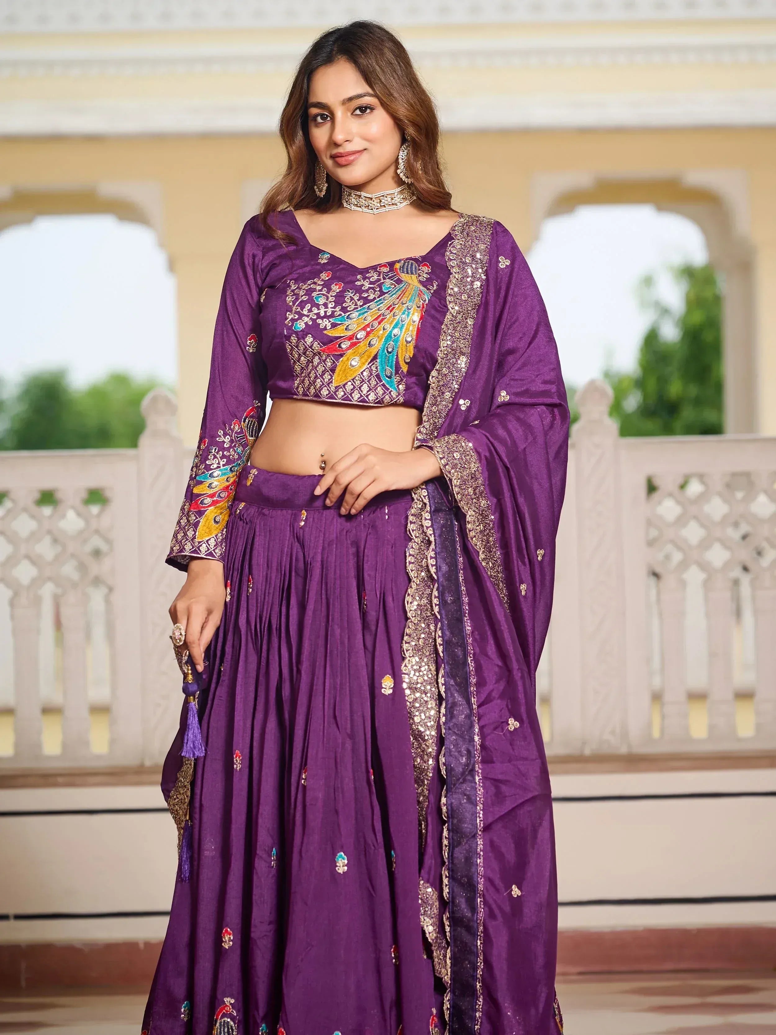 Purple embroidered lehenga choli with peacock design, perfect for Indian ethnic wear occasions