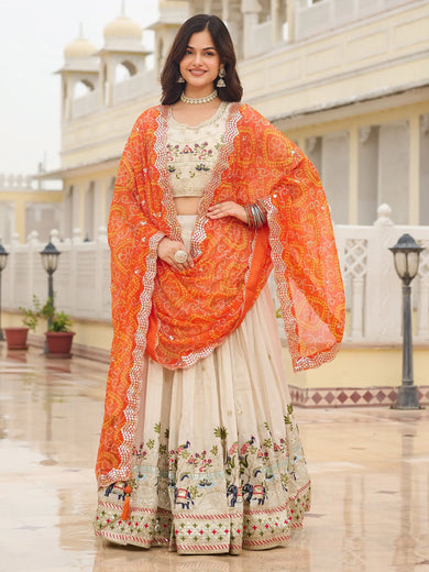 Majestic Off-White Sequnis Silk Lehenga Choli With Orange Dupatta