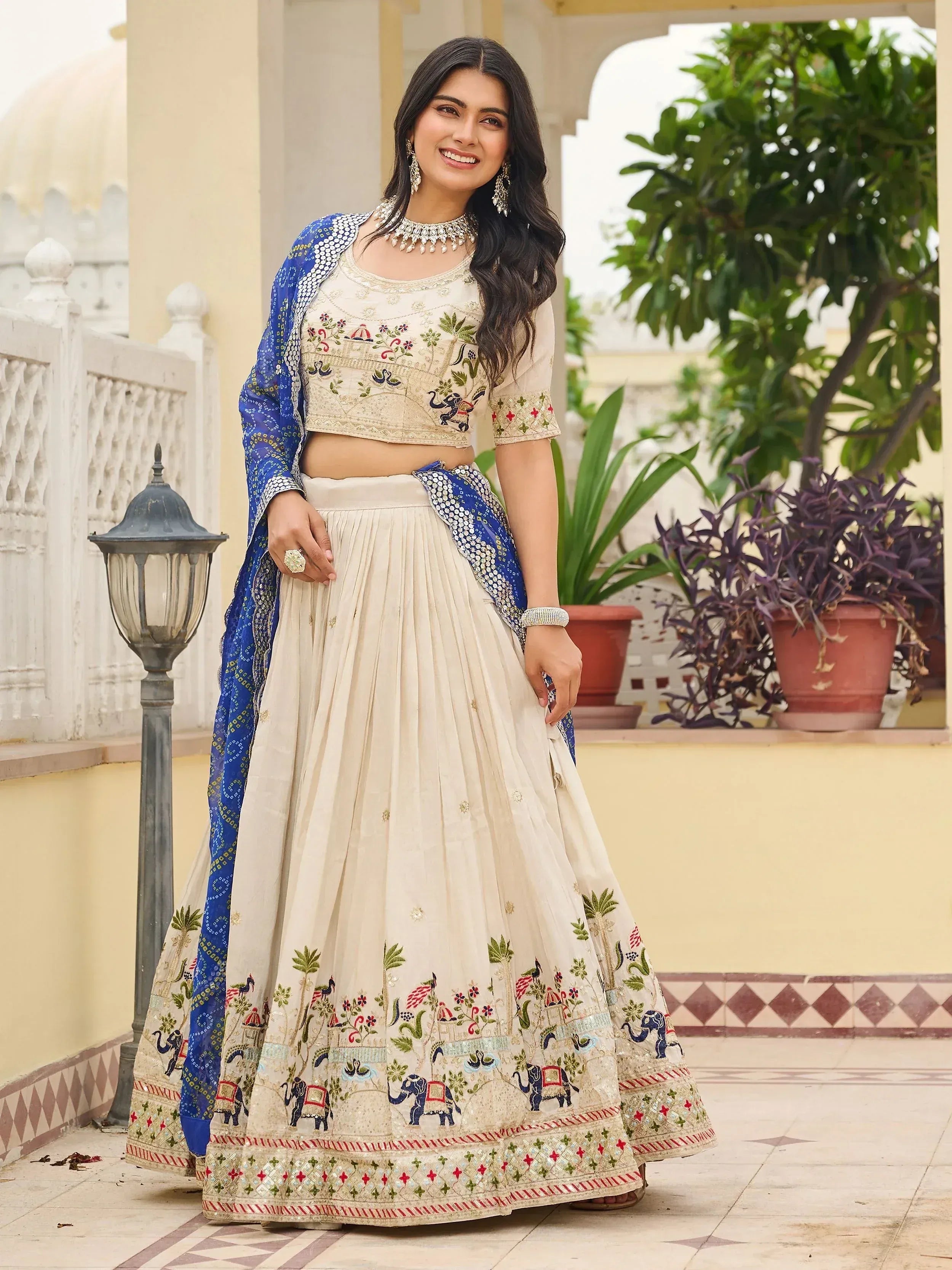 Graceful Off-White Sequnis Silk Lehenga Choli With Blue Dupatta