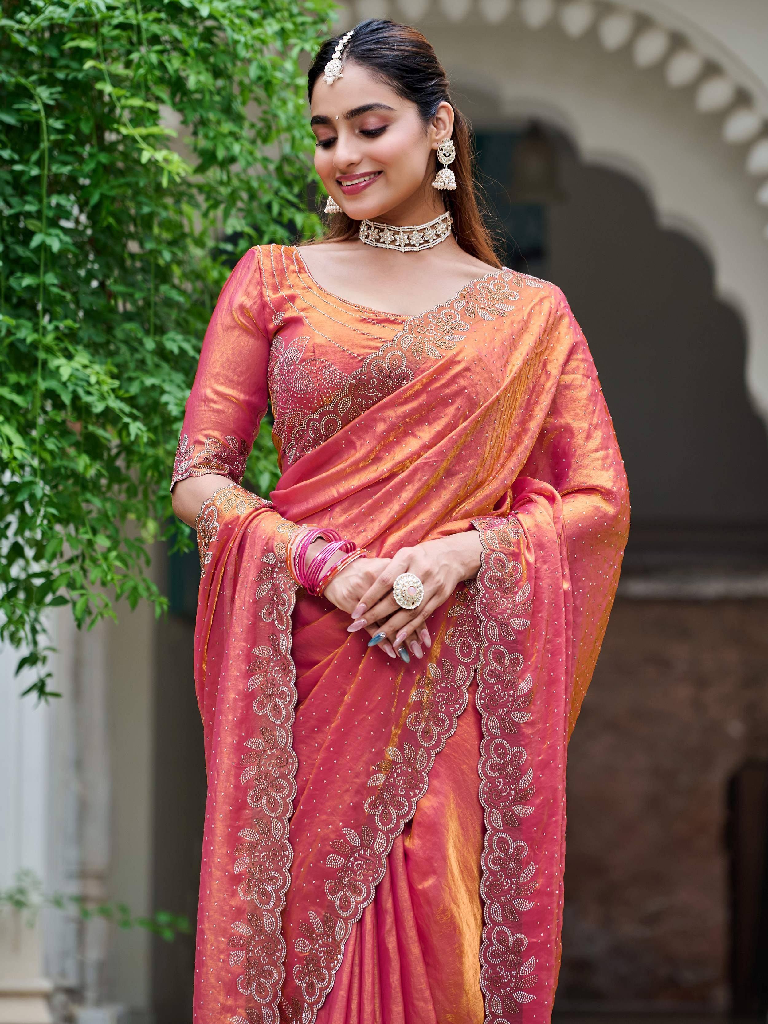 Elegant pink and orange embroidered saree with floral detailing, perfect for Indian ethnic wear occasions