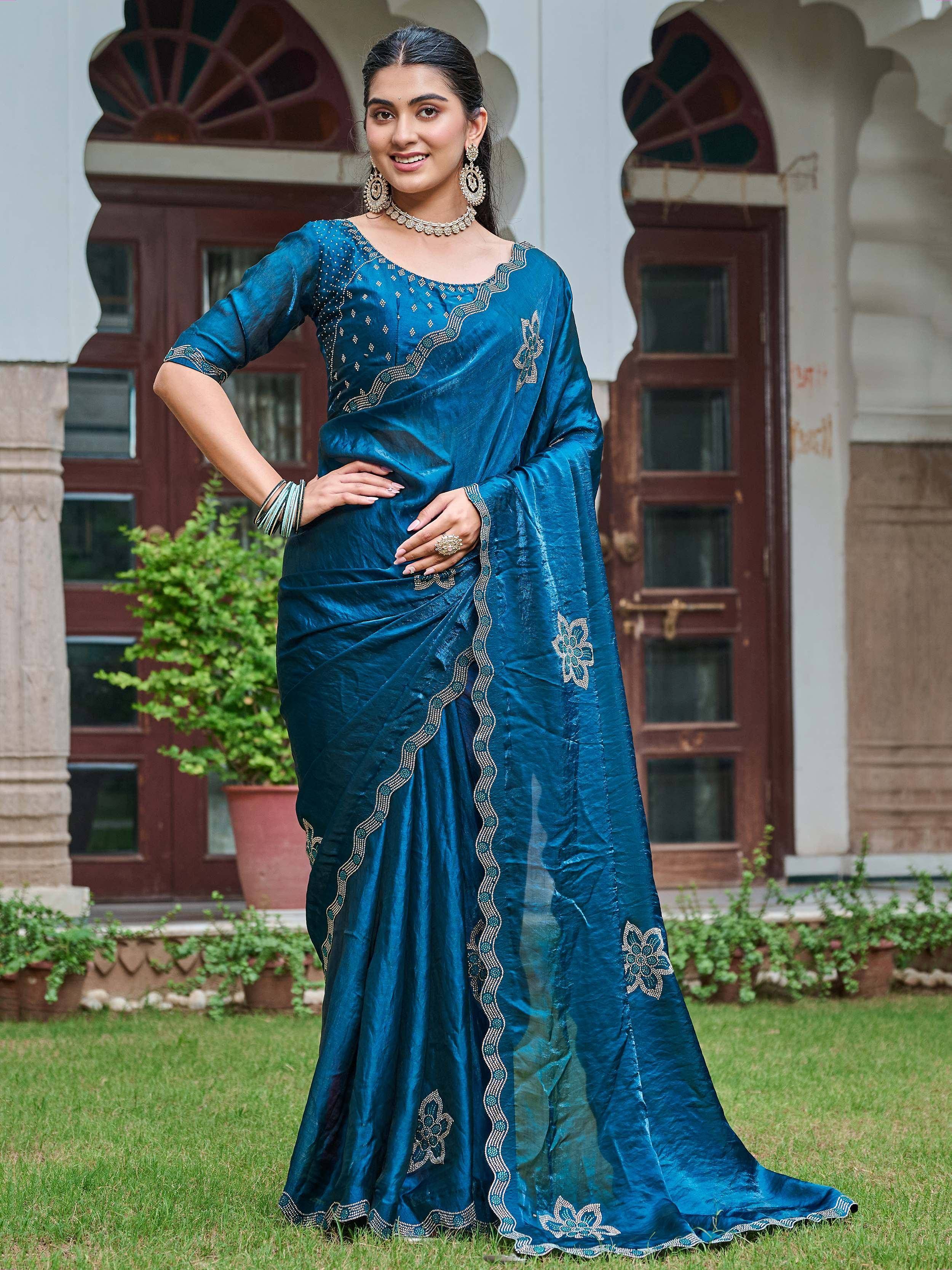 Teal blue embroidered saree with gold detailing, perfect for Indian ethnic occasions and festive wear.
