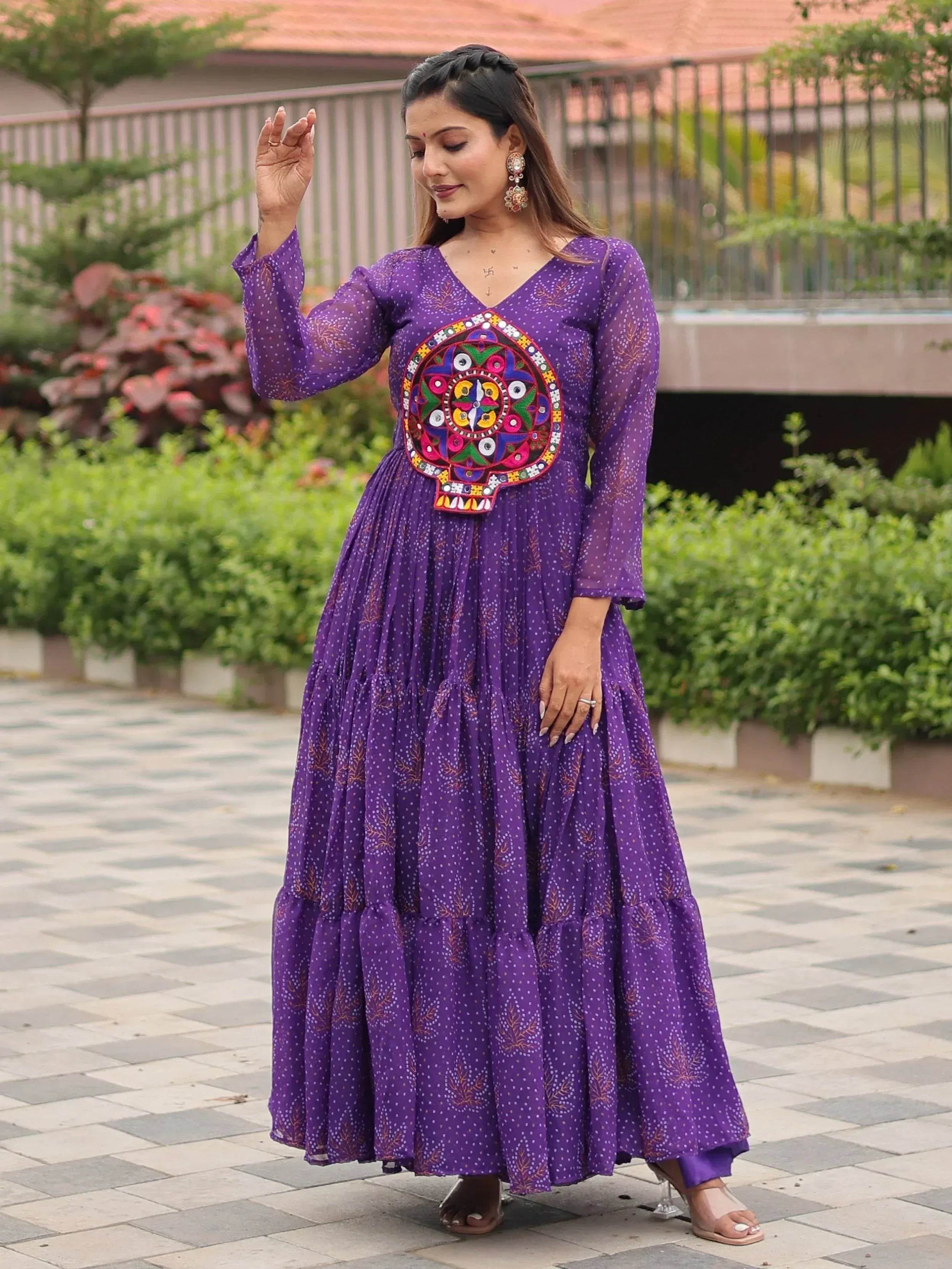 Purple ethnic gown with mirror work, perfect for Indian occasions and festive wear