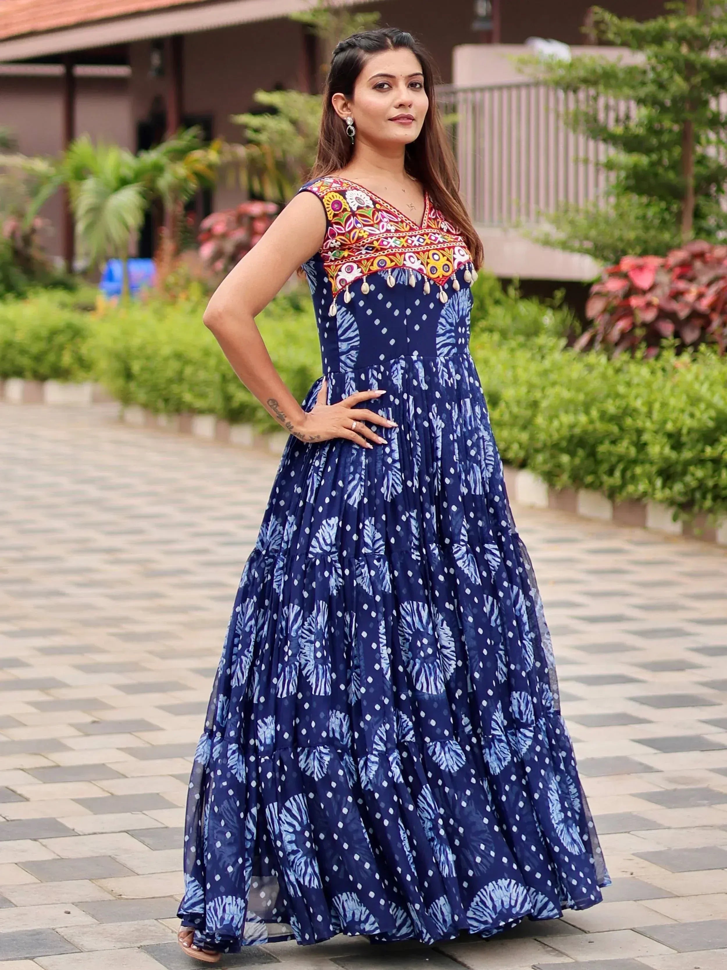 Blue ethnic gown with colorful embroidery and floral print, perfect for Indian festive wear