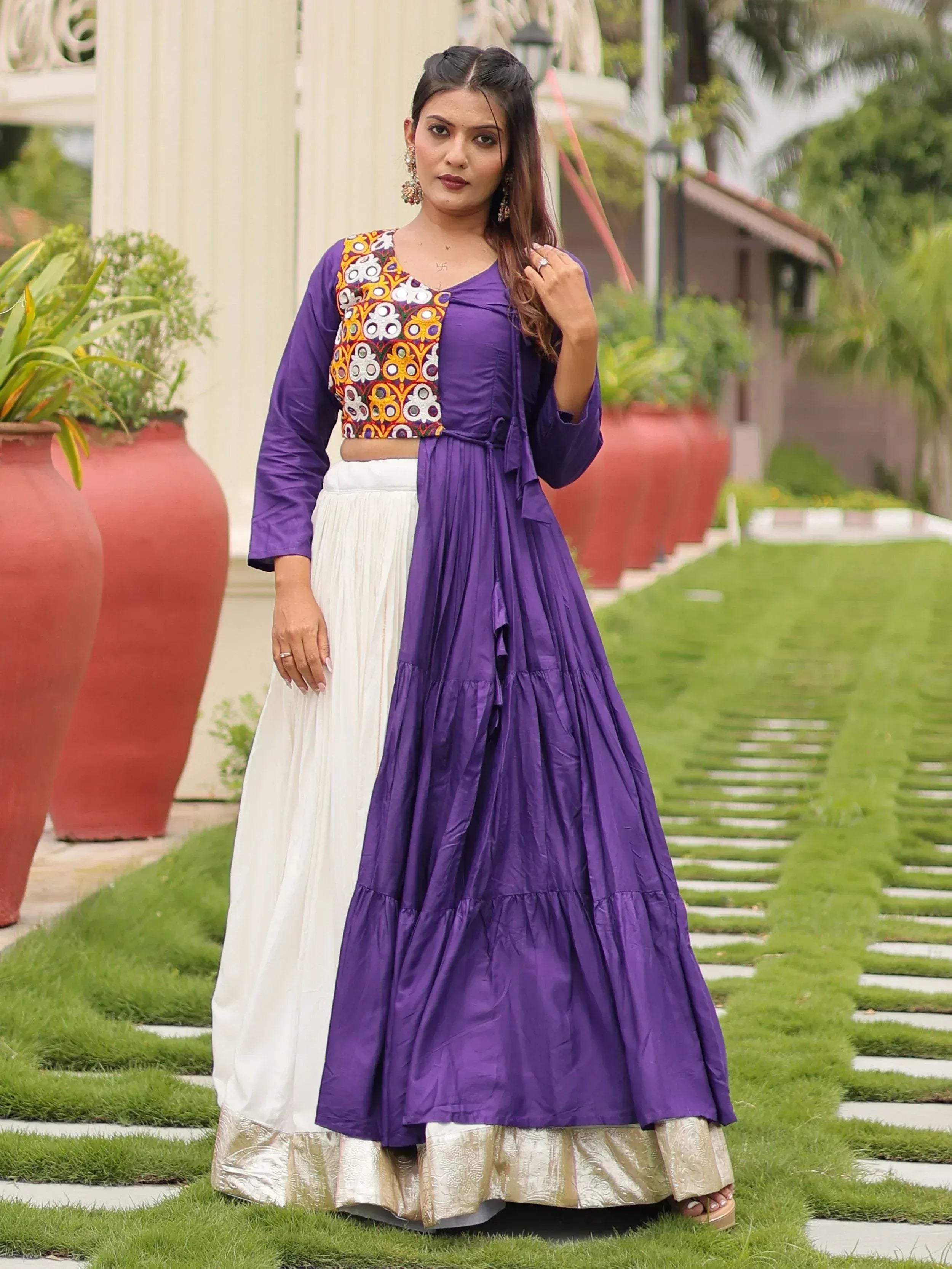 Purple and white ethnic gown with embroidered crop top, perfect for Indian occasions and festive wear.