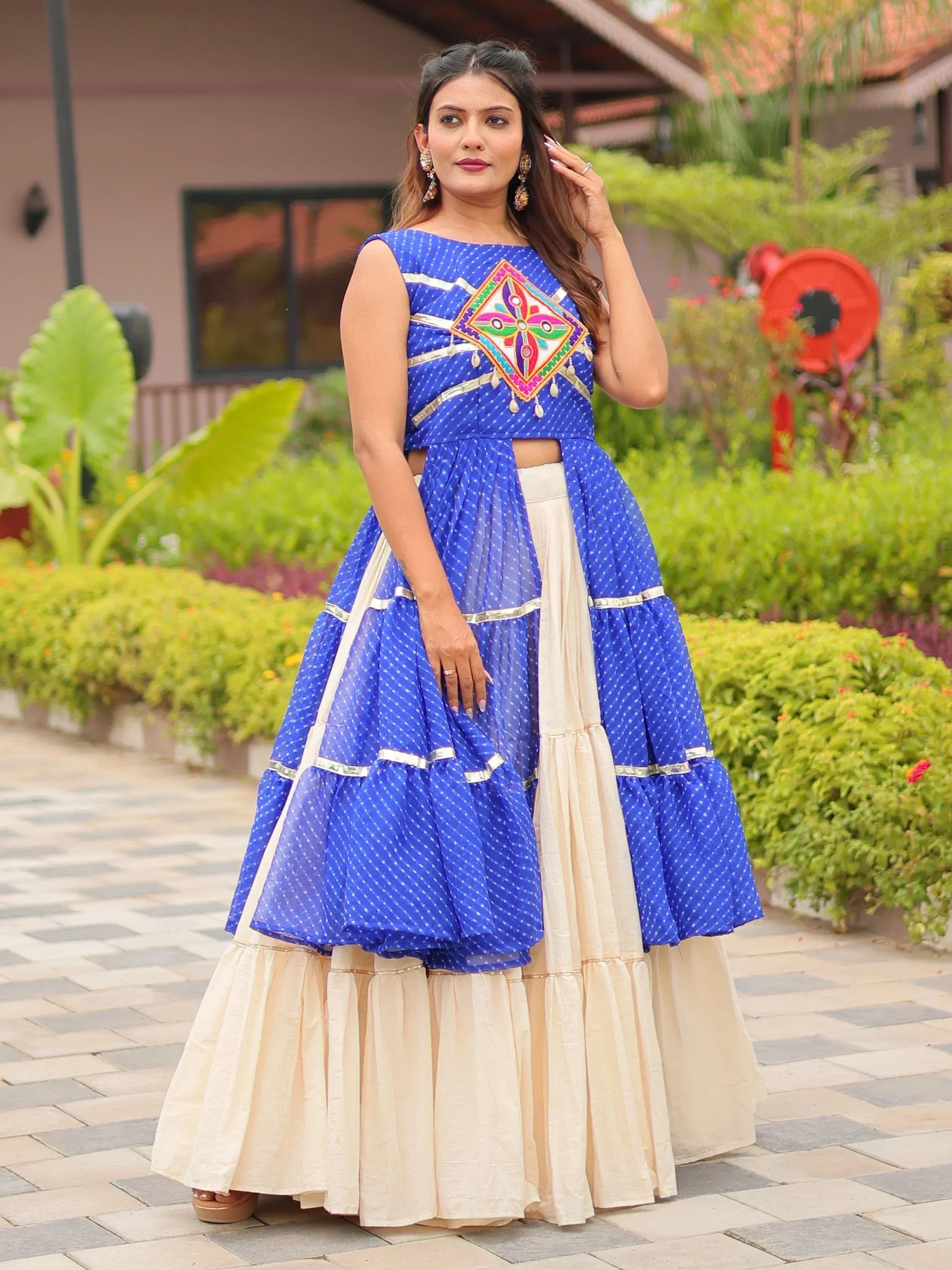 Blue and cream ethnic lehenga choli with mirror work, perfect for Indian weddings and festivals