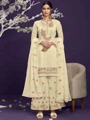 Woman in cream embroidered salwar kameez and dupatta, floral details, Ethnic Plus fashion