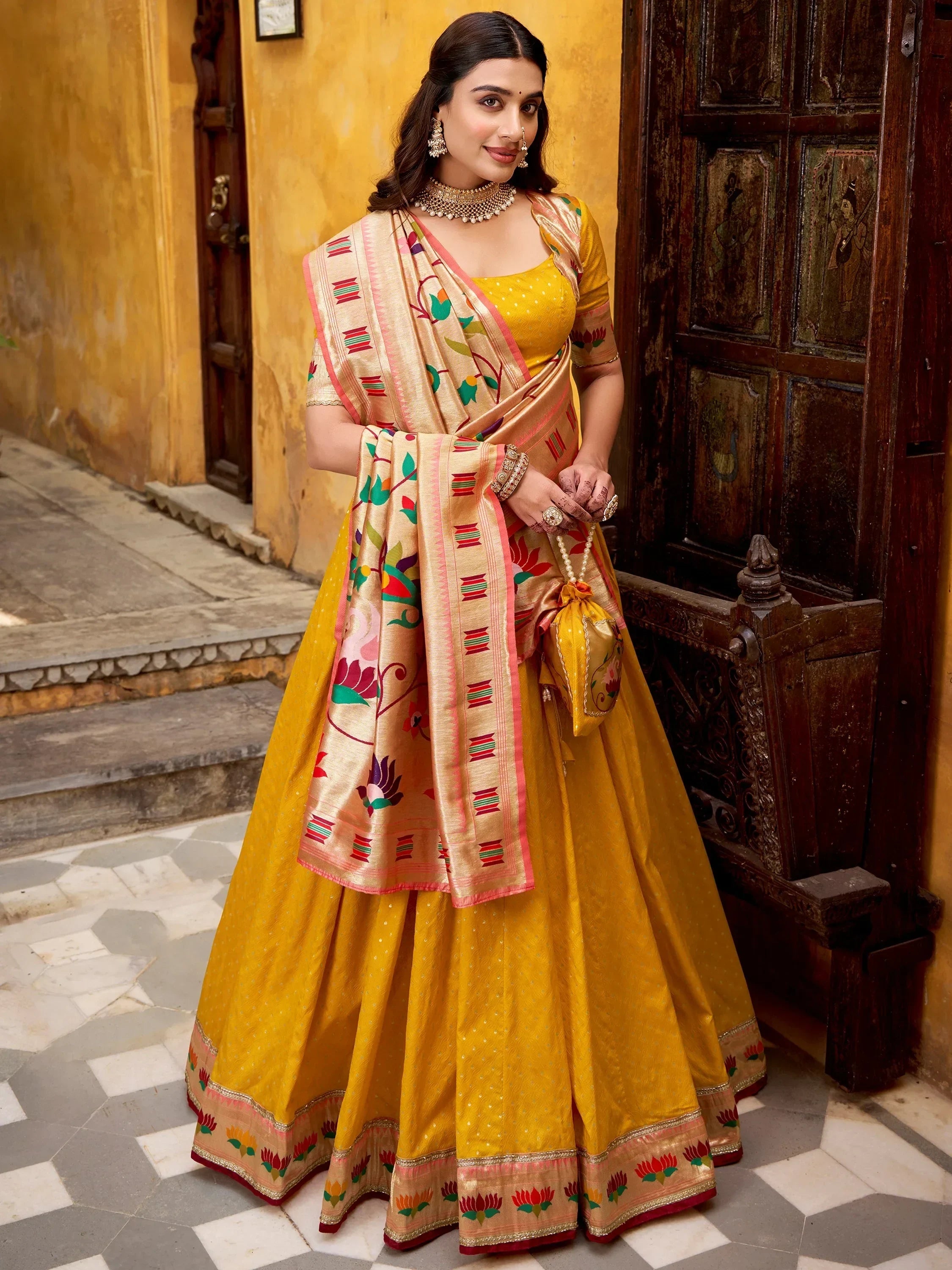 Charming Yellow Zari Weaving Silk Wedding Wear Lehenga Choli