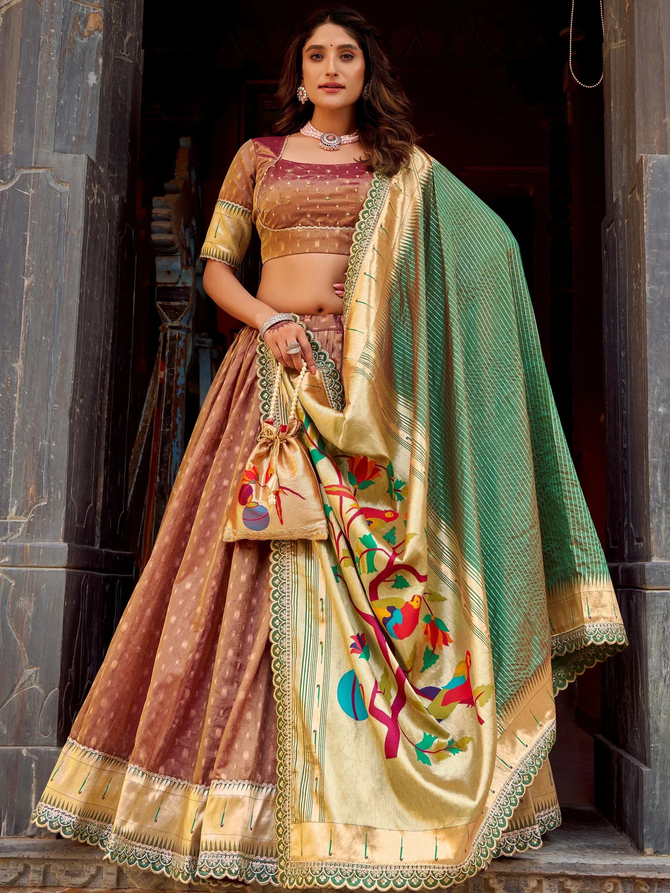 Bewitching Brown Zari Weaving Silk Festival Wear Lehenga Choli With Dupatta