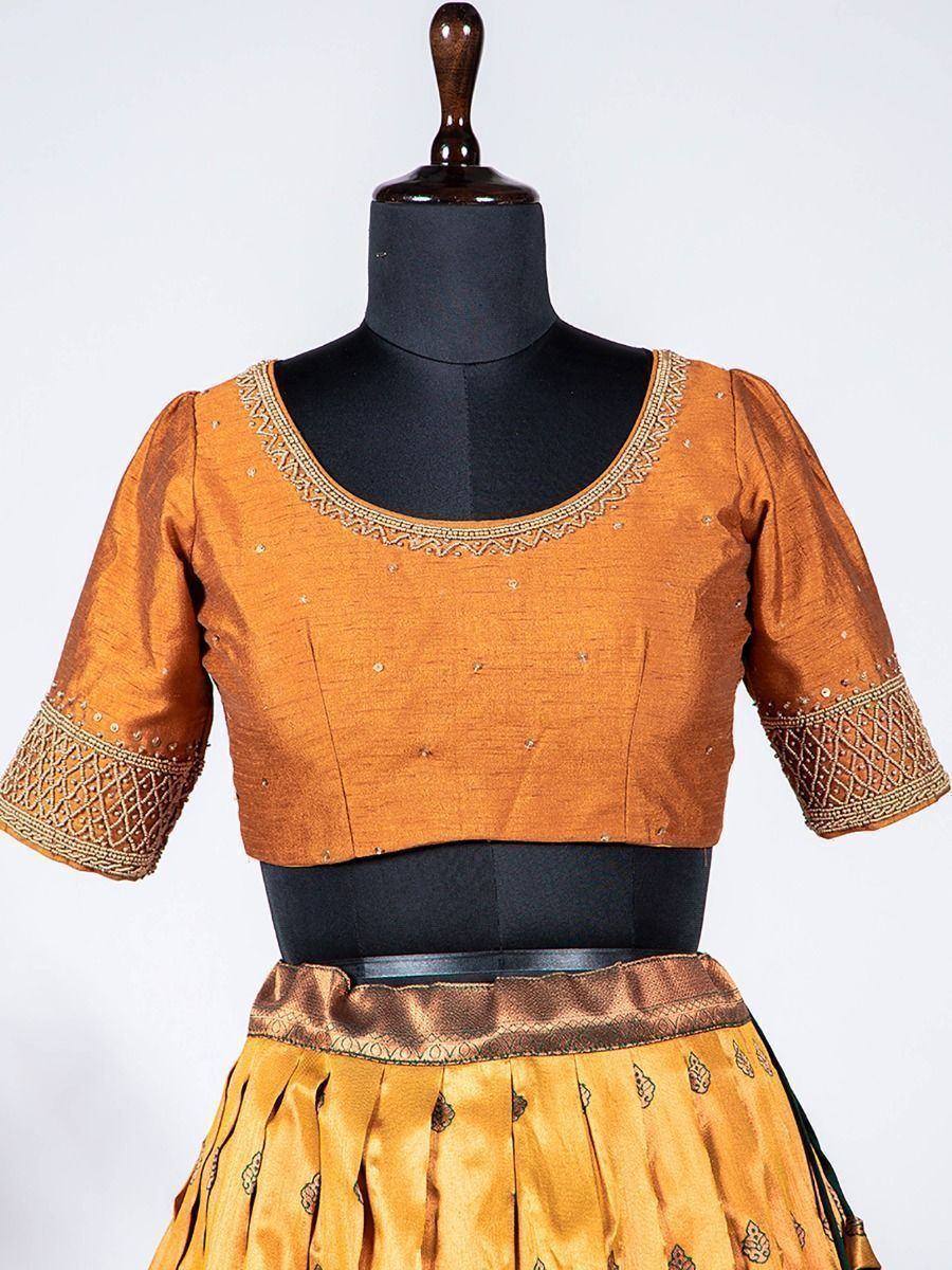 Mustard ethnic lehenga choli with embroidered blouse and pleated skirt, perfect for Indian weddings and festivals