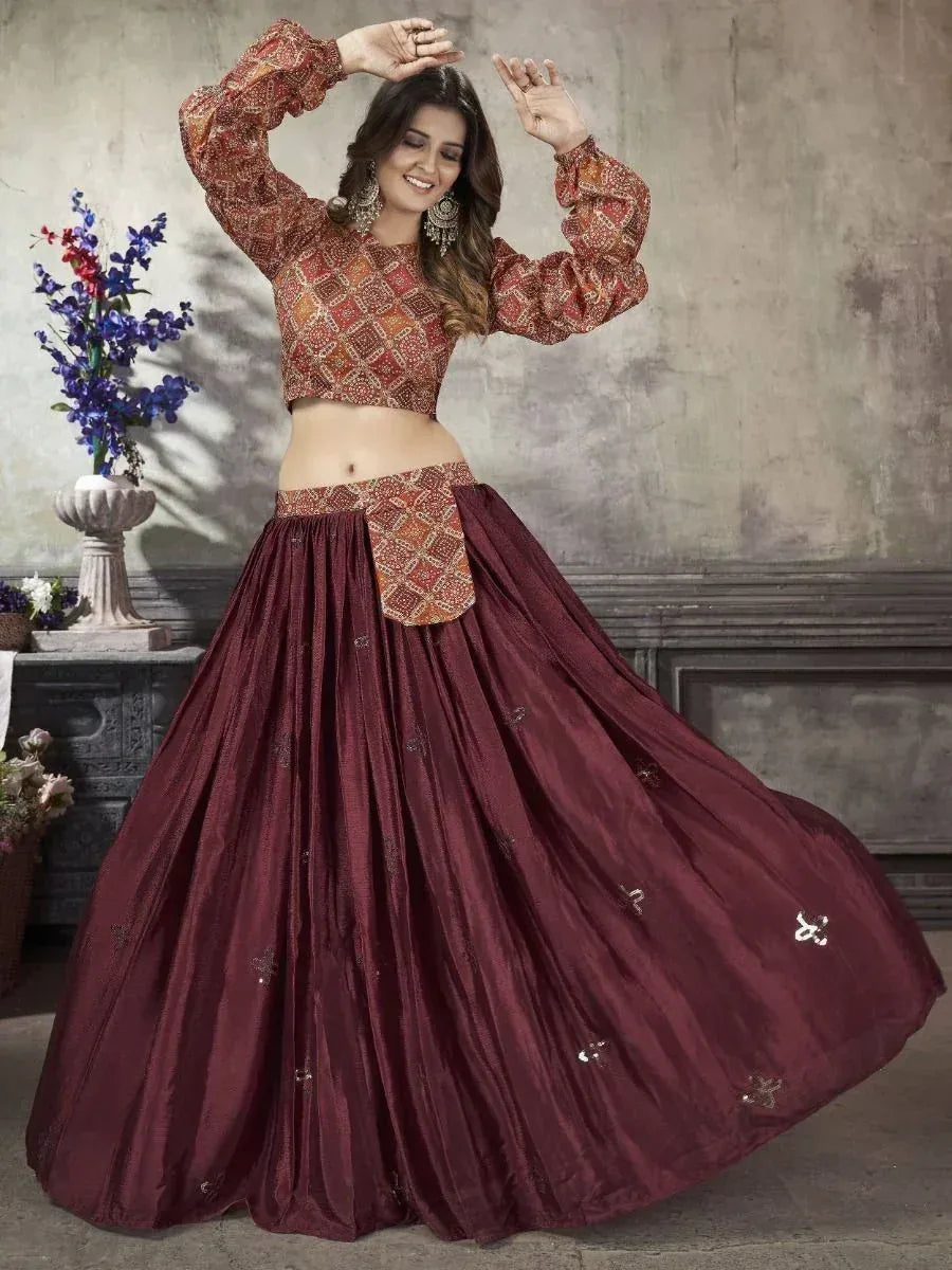 Woman in maroon lehenga choli with printed blouse, ethnic wear for festive occasions