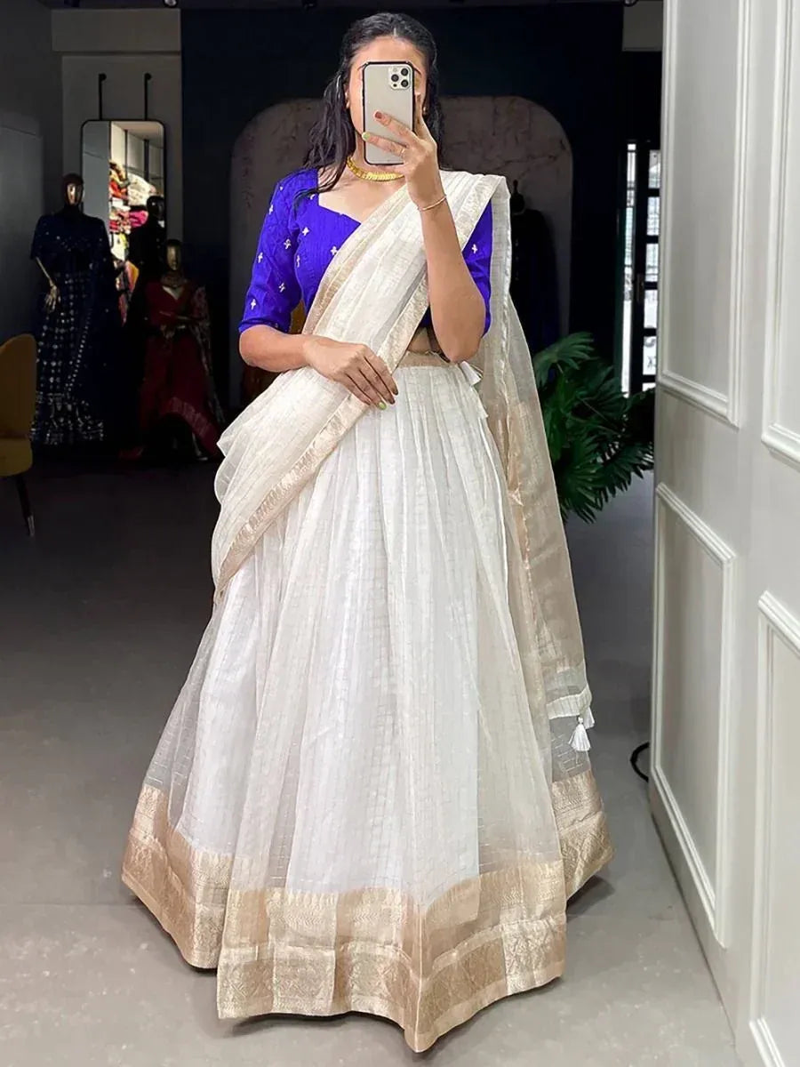 White lehenga with gold border and blue blouse, Indian ethnic wear for women