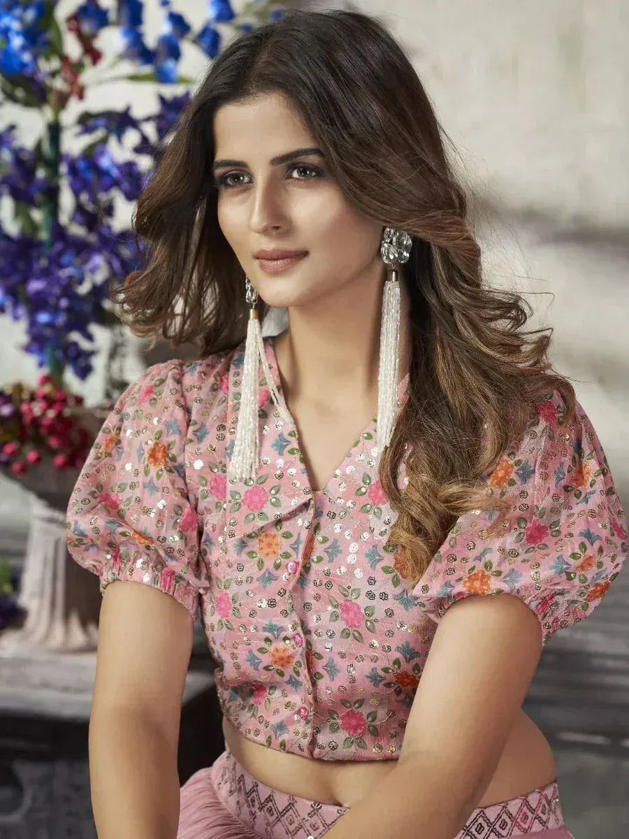 Pink floral embroidered blouse with puff sleeves, paired with matching ethnic skirt, ideal for Indian occasions