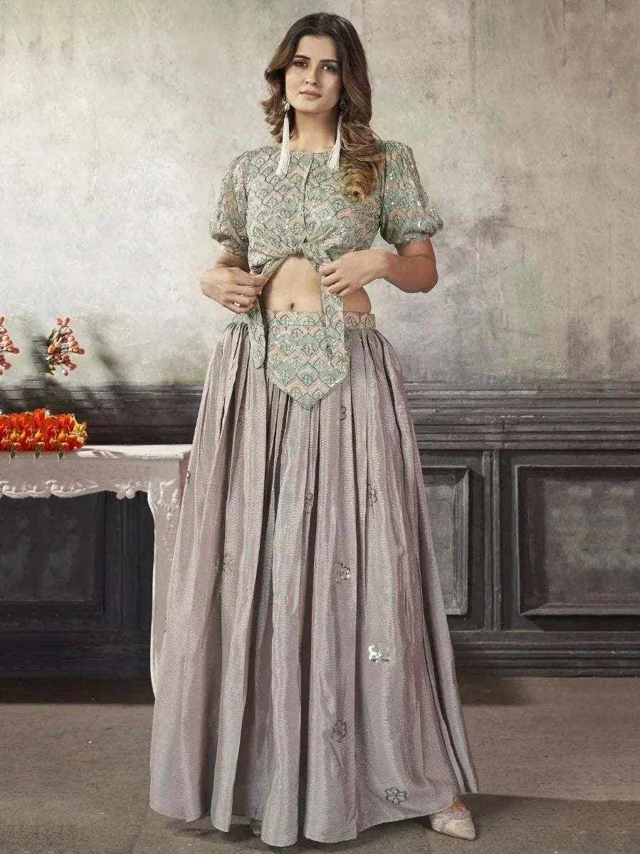 Elegant grey lehenga choli with printed blouse and floral embroidery, perfect for Indian ethnic occasions.