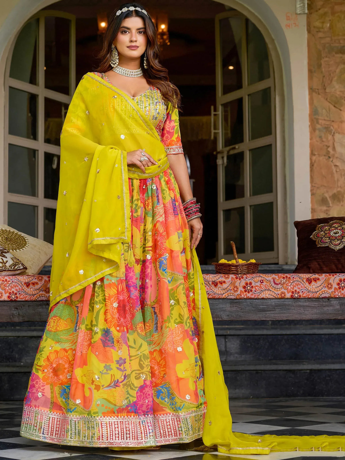 Vibrant yellow floral print lehenga choli with embroidered dupatta, perfect for Indian ethnic occasions