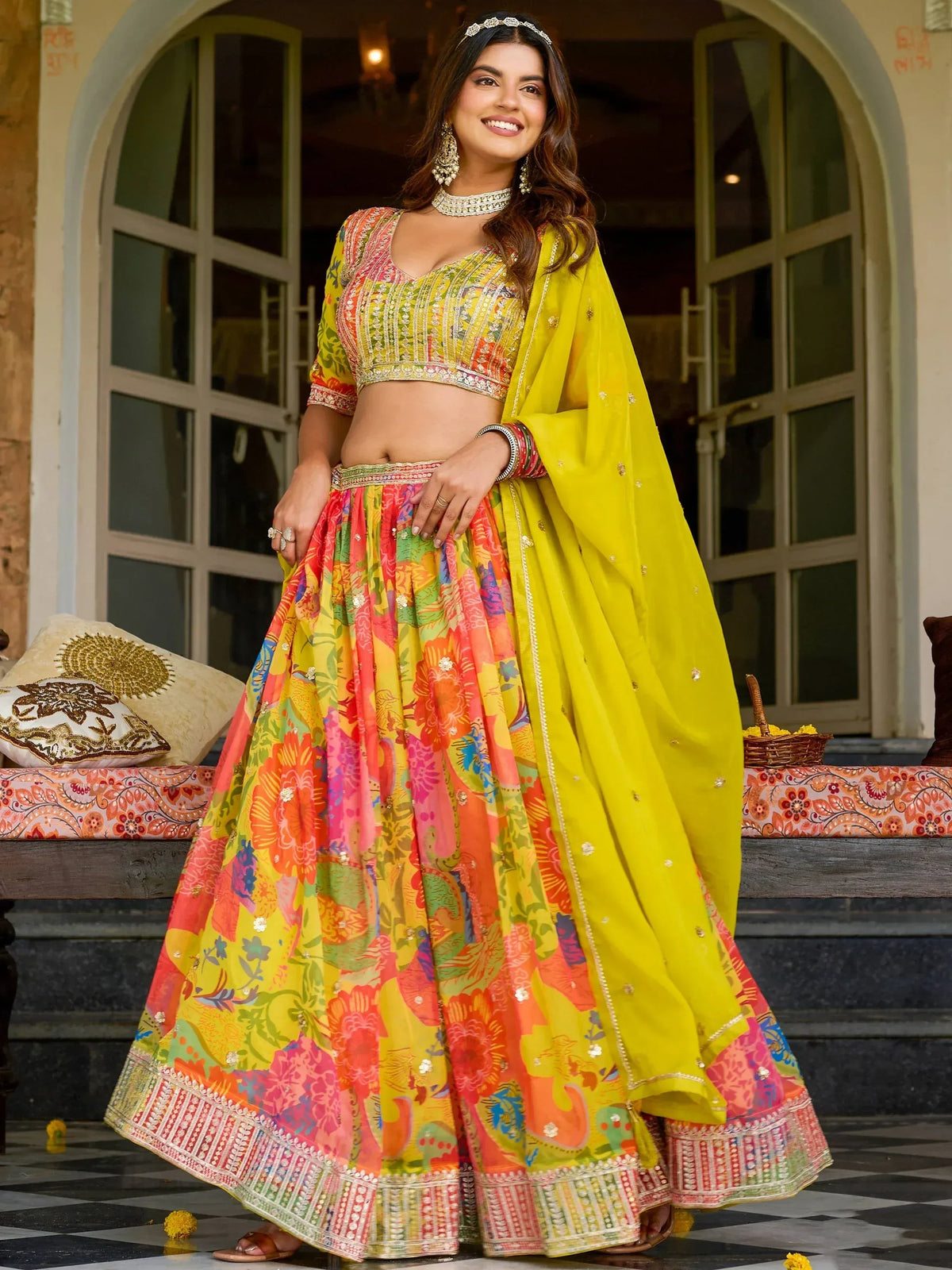Vibrant floral print lehenga choli with yellow dupatta, perfect for Indian ethnic wear occasions.